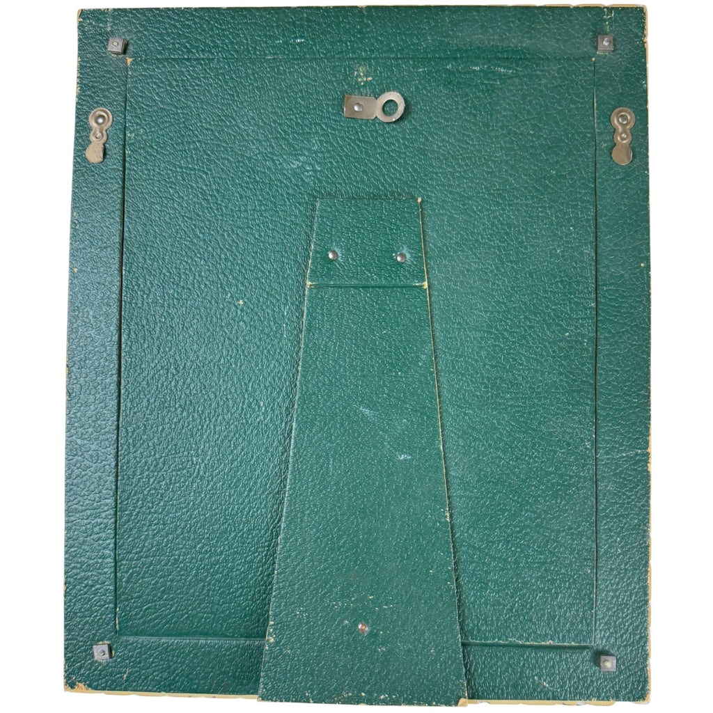Reverse of vintage Art Deco picture frame showing original green textured leatherette paper backing,