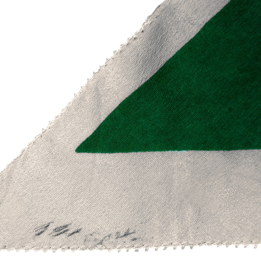 Edge detail showing original silk fabric and dry cleaner identification marking