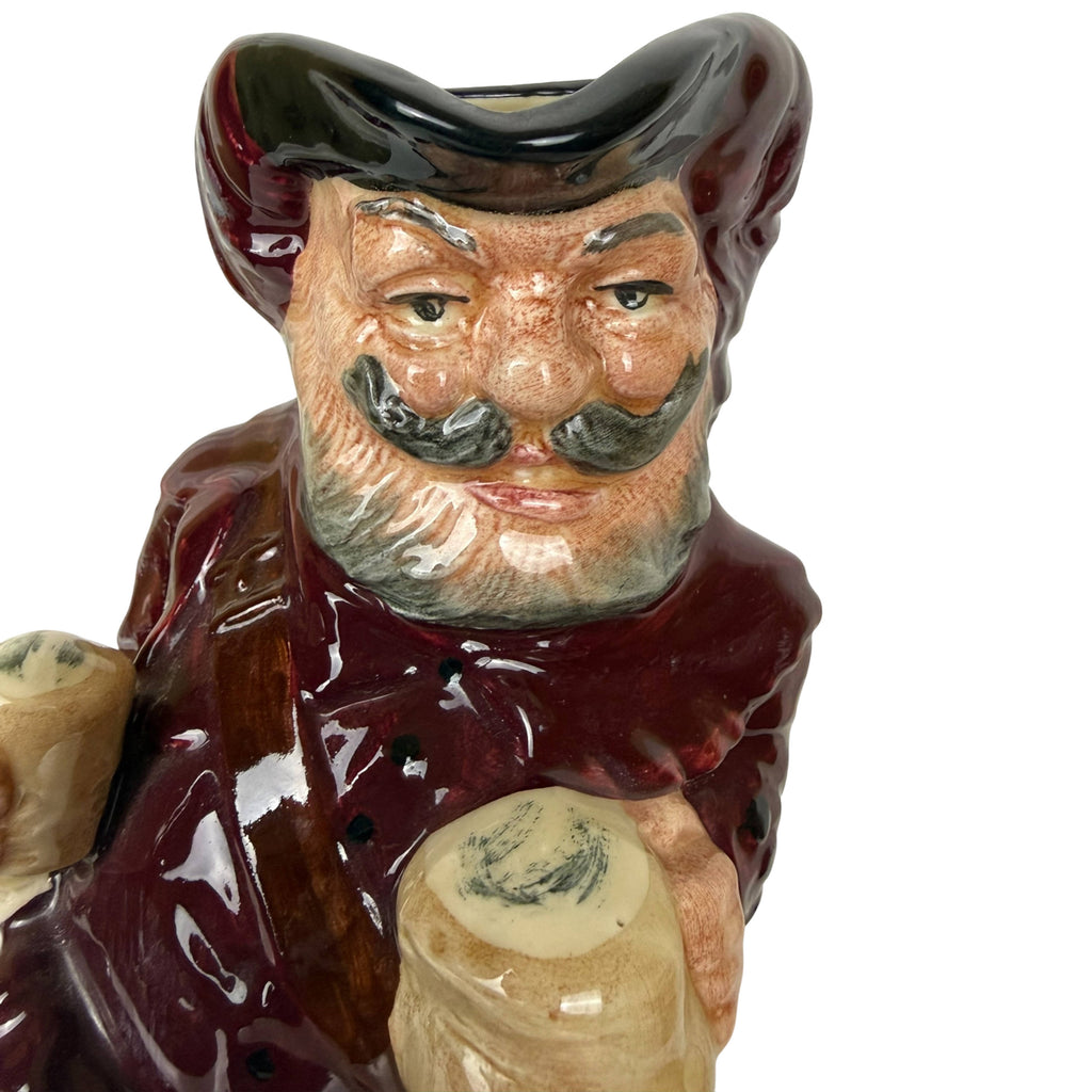 Royal Doulton Falstaff Toby jug holding tankard