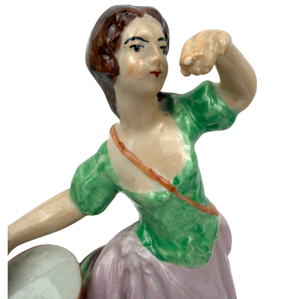 close up of staffordshire figurine