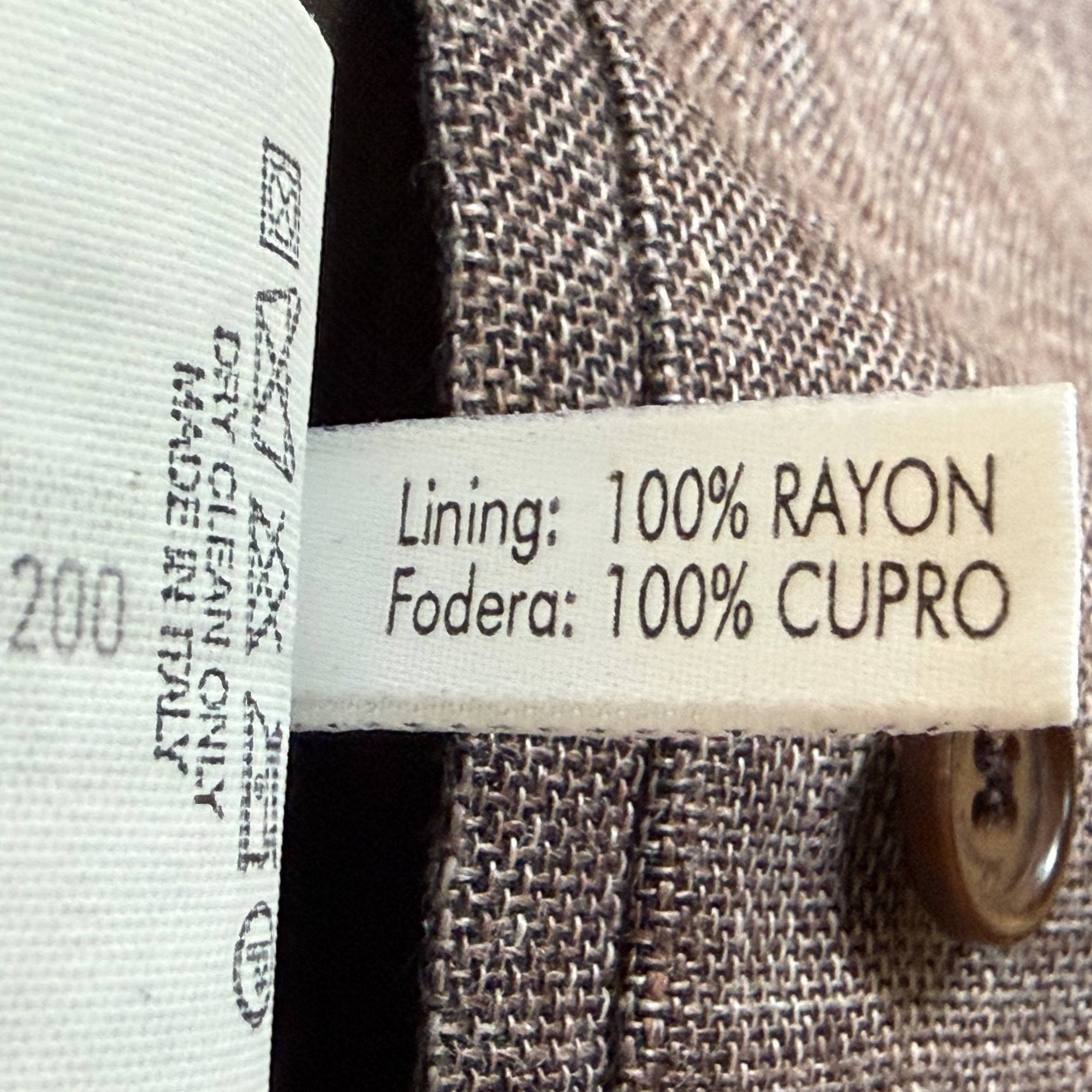 Salvatore Ferragamo blazer label showing 55% linen 45% cotton and 100% cupro lining
