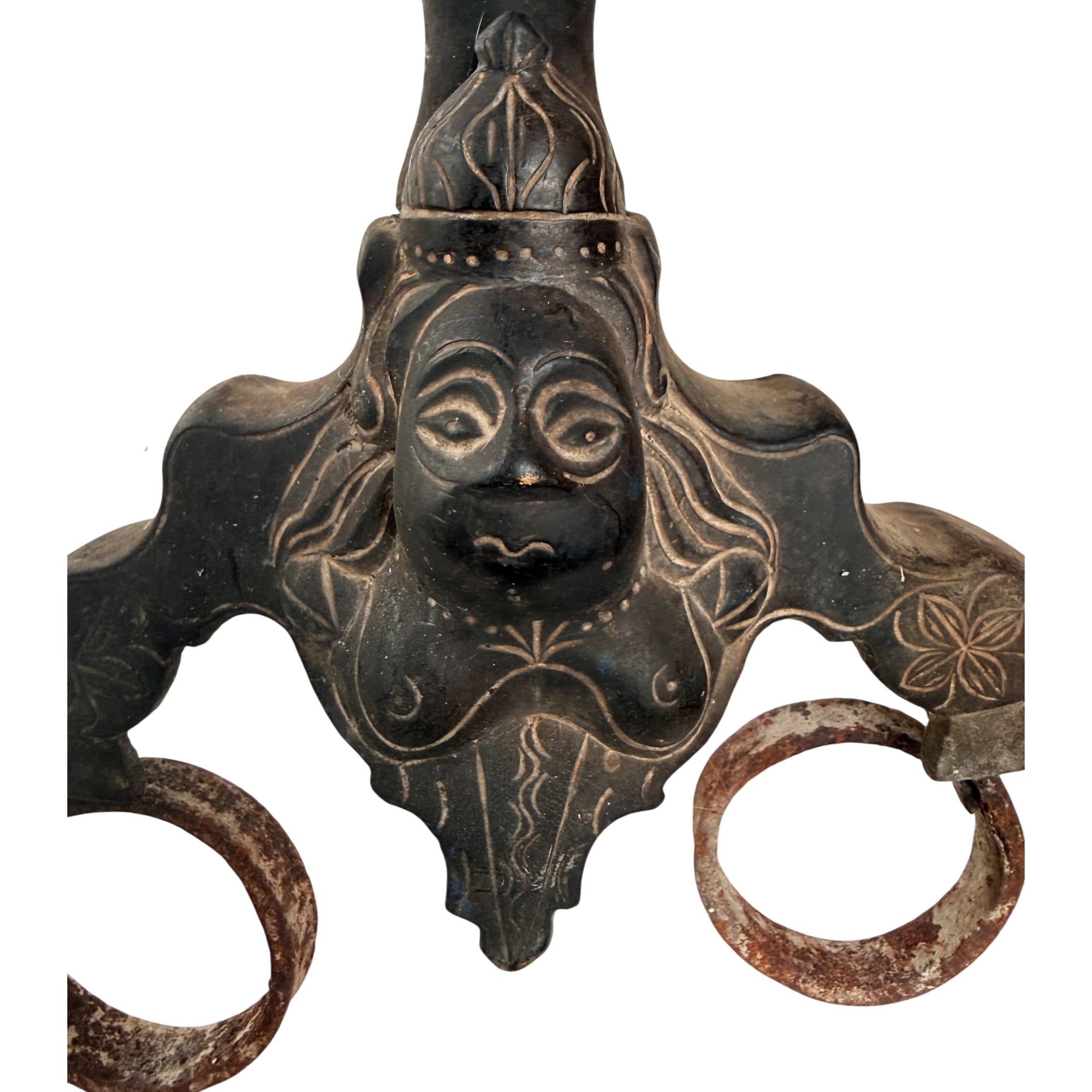 detail of antique marmouset andiron