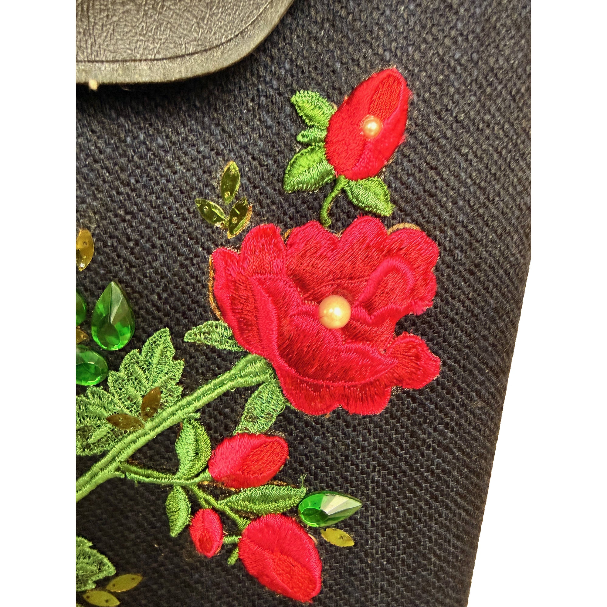 Embroidered red roses and green rhinestones on vintage black handbag