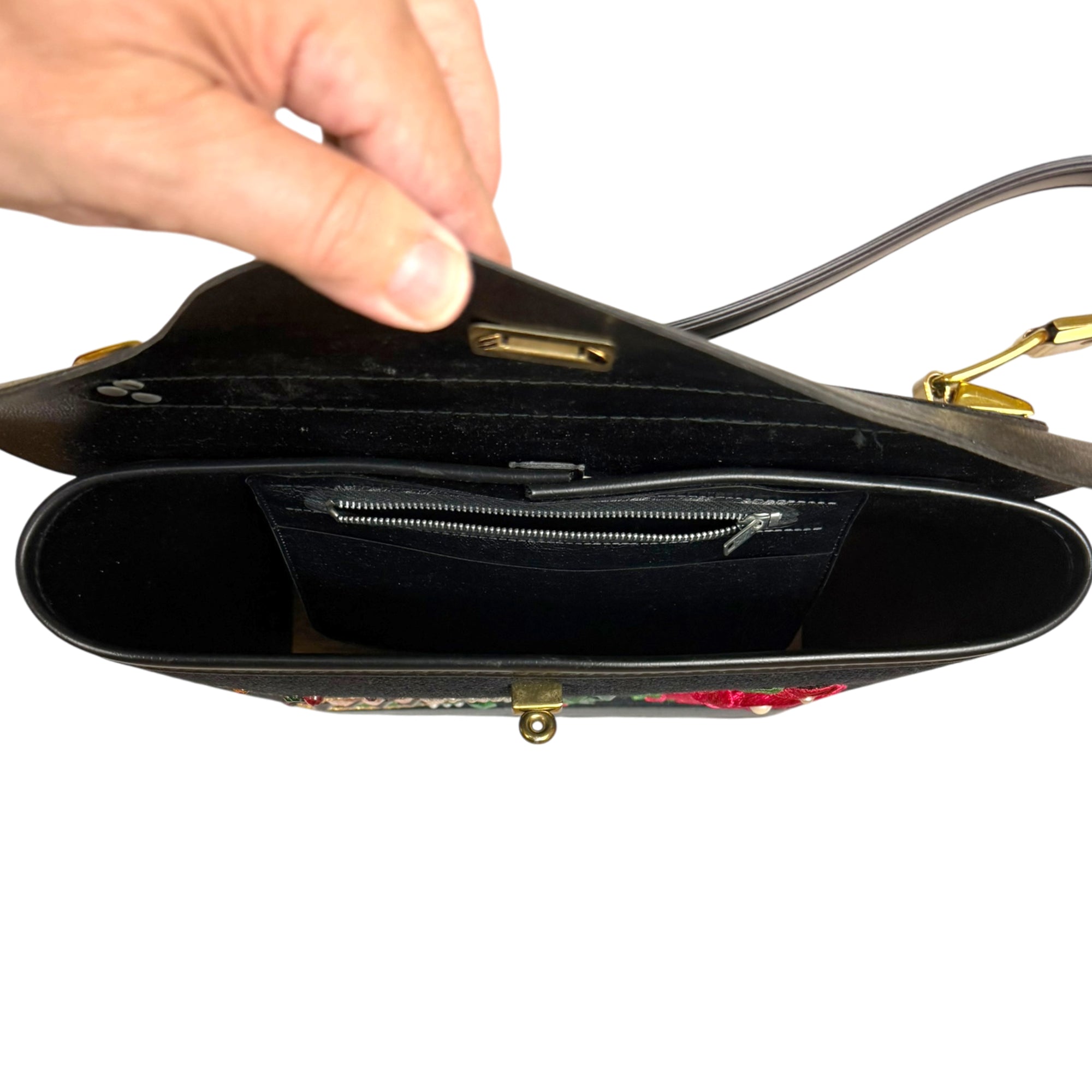 Black interior with zippered pocket in vintage 1960s handbag