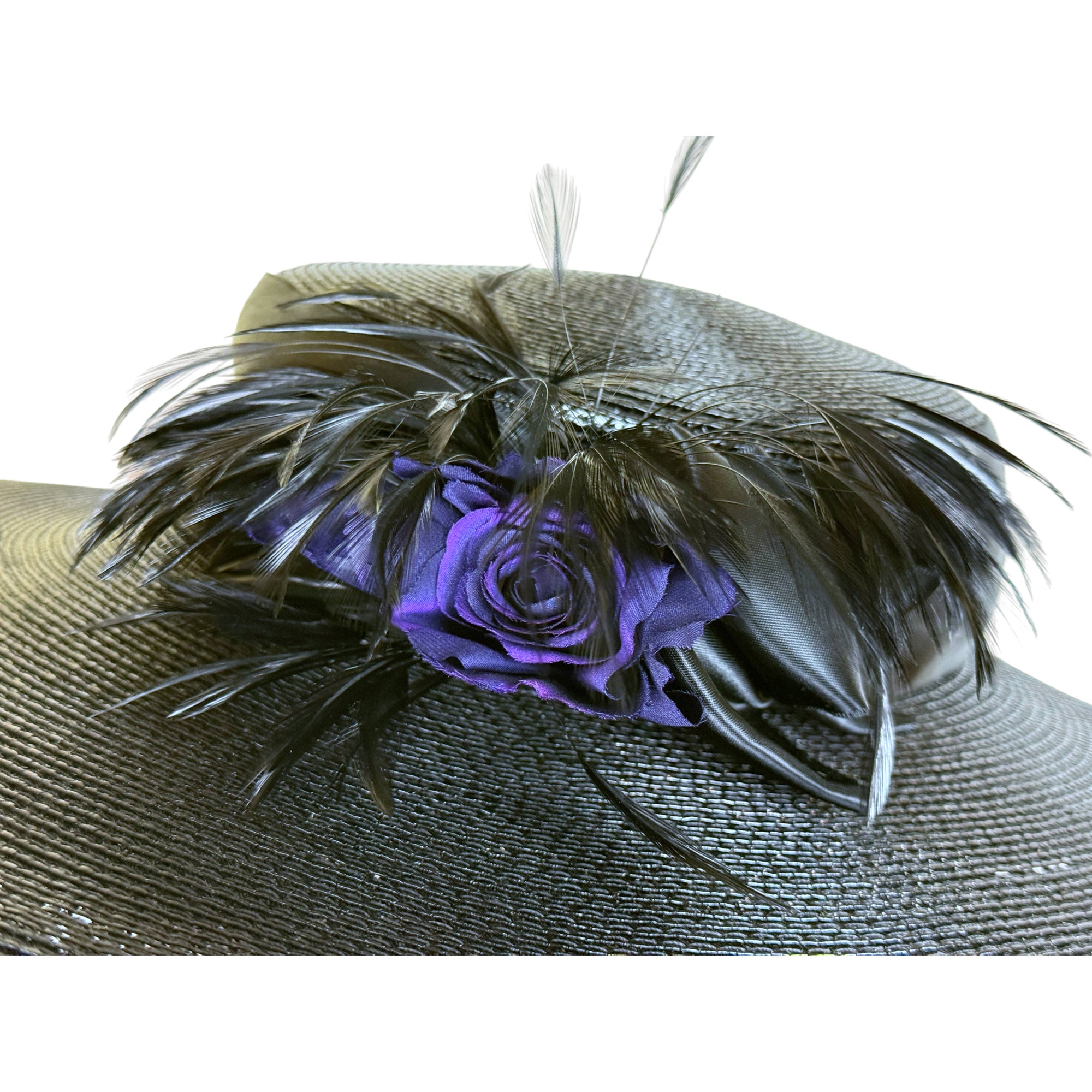 flower and feather decoration on fleur de paris hat