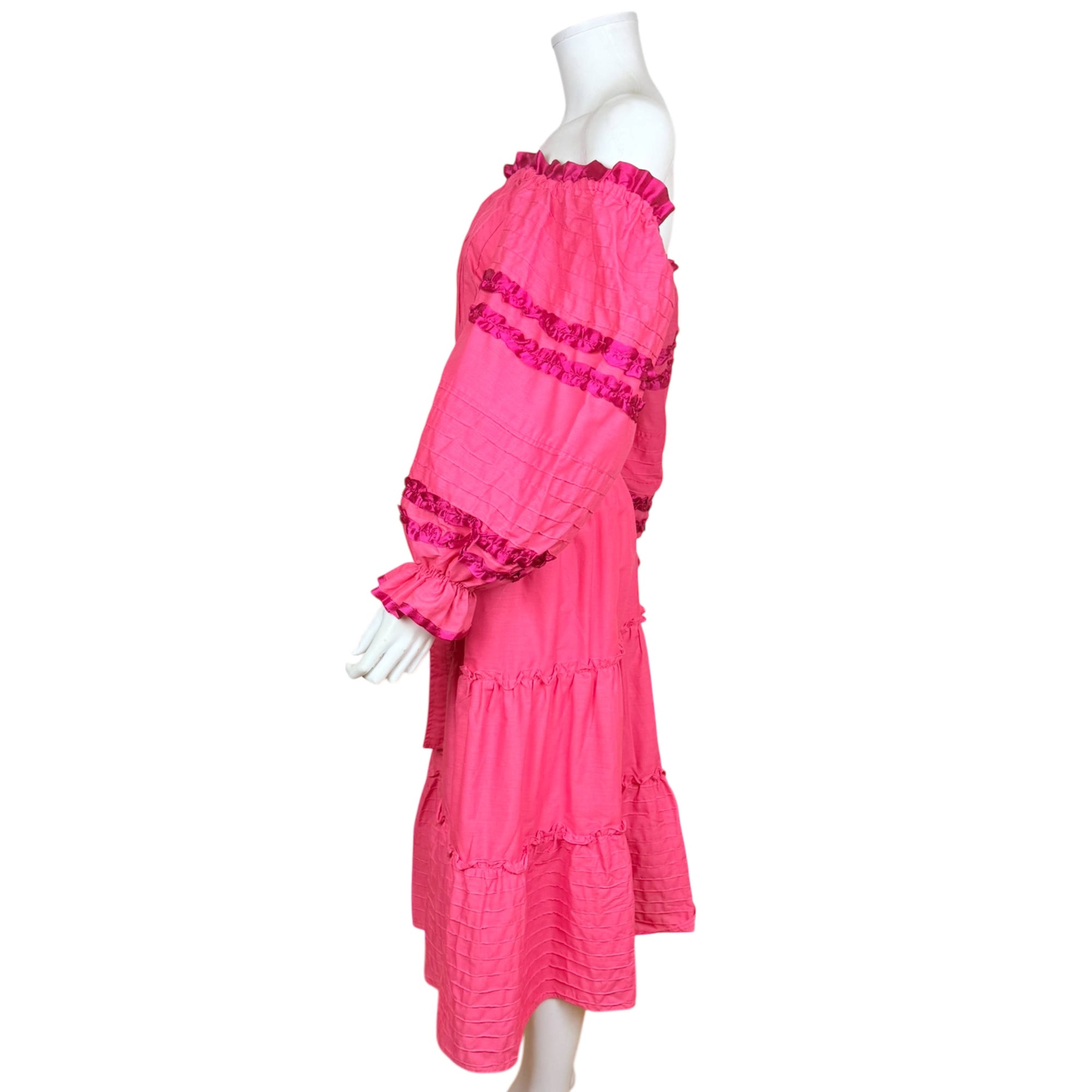 Georgia Charuhas pink off shoulder dress left side view