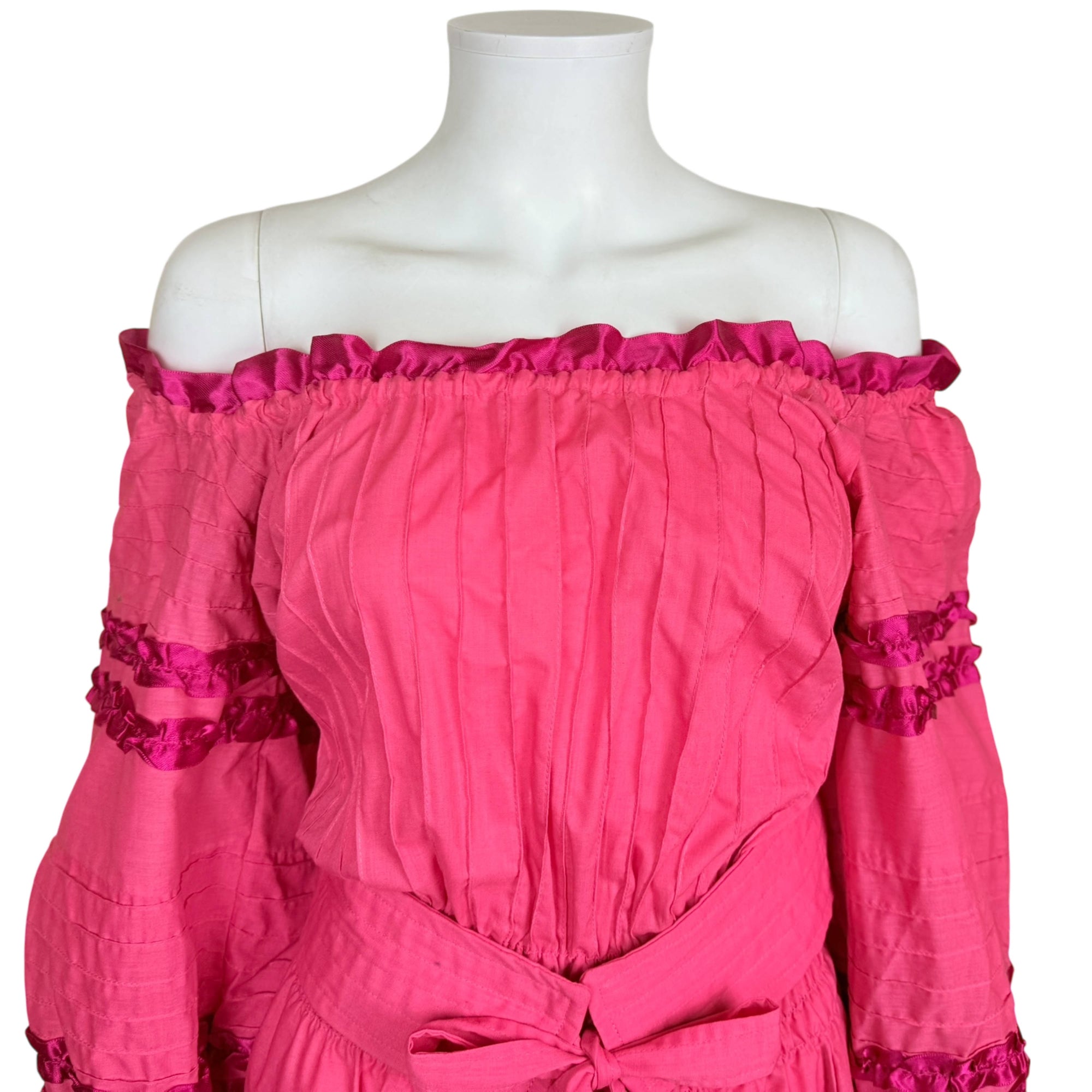 Close up view of Georgia Charuhas Mexican dress