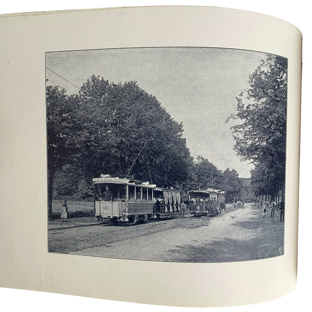A streetcar photograph printed on an open page from the 1892 Union Elektricitäts-Gesellschaft book