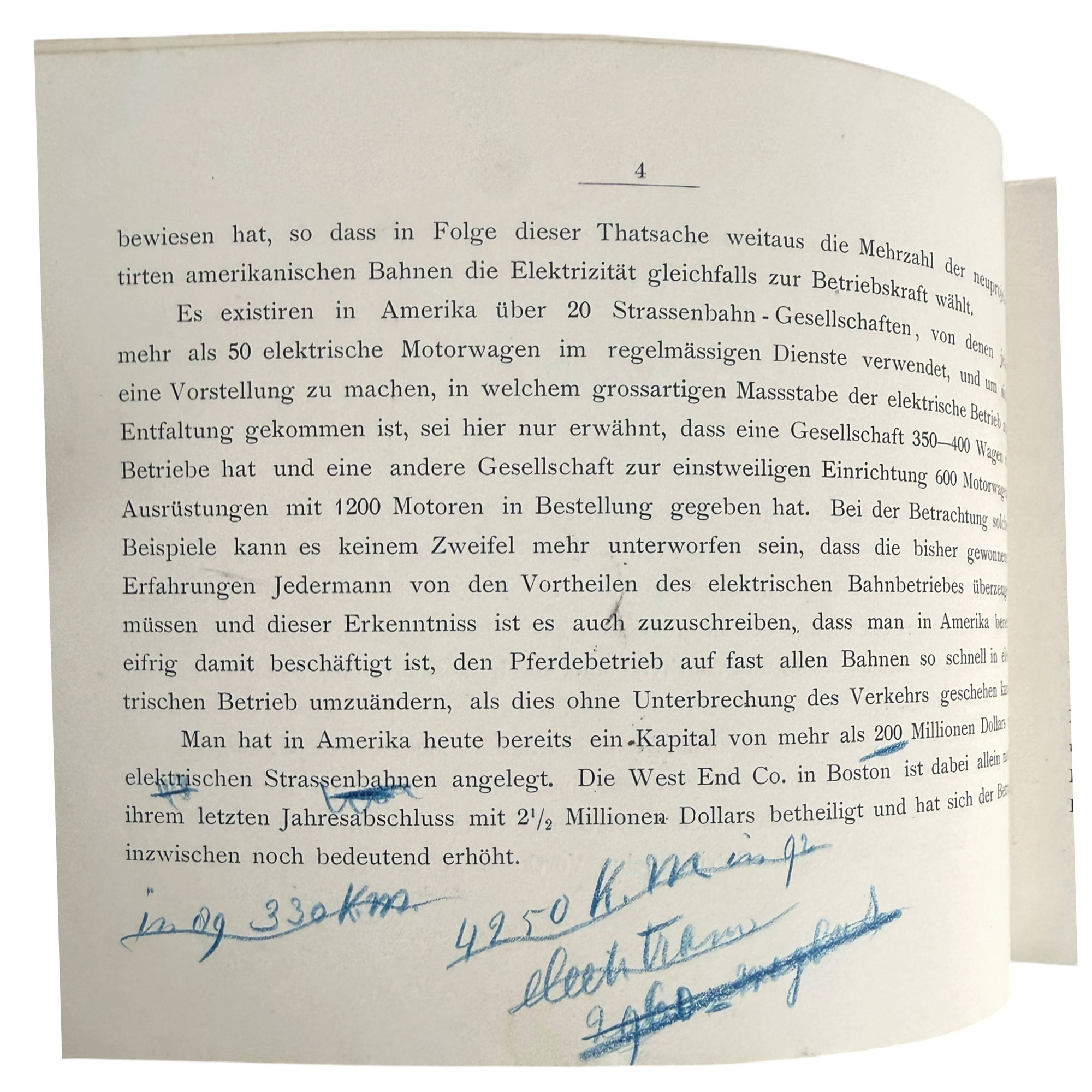 A scanned vintage German book page with printed black text and blue handwritten ink annotations