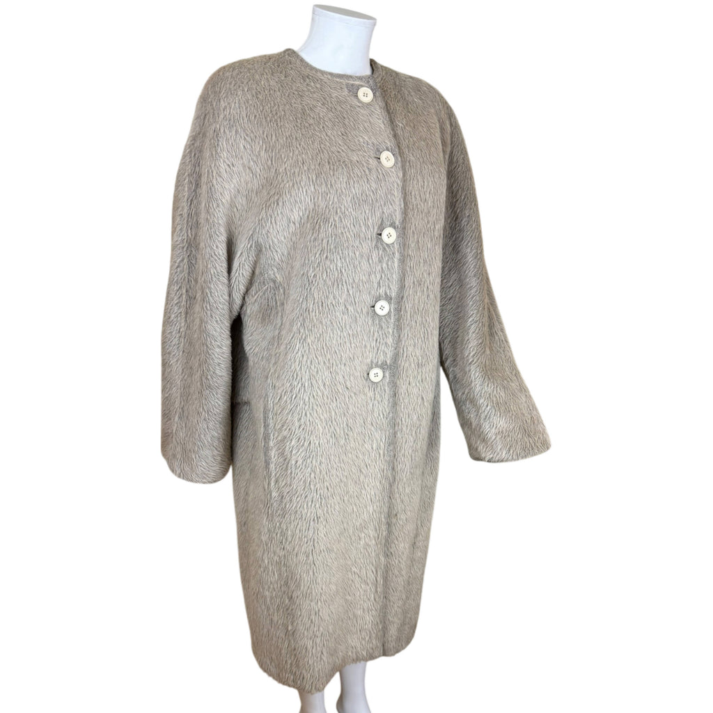 Three-quarter front view of oversized Gianfranco Ferré Agnona alpaca wool coat with cream buttons
