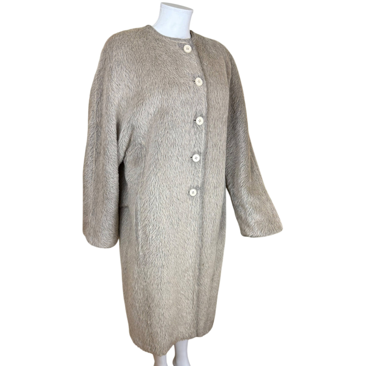 Three-quarter front view of oversized Gianfranco Ferré Agnona alpaca wool coat with cream buttons