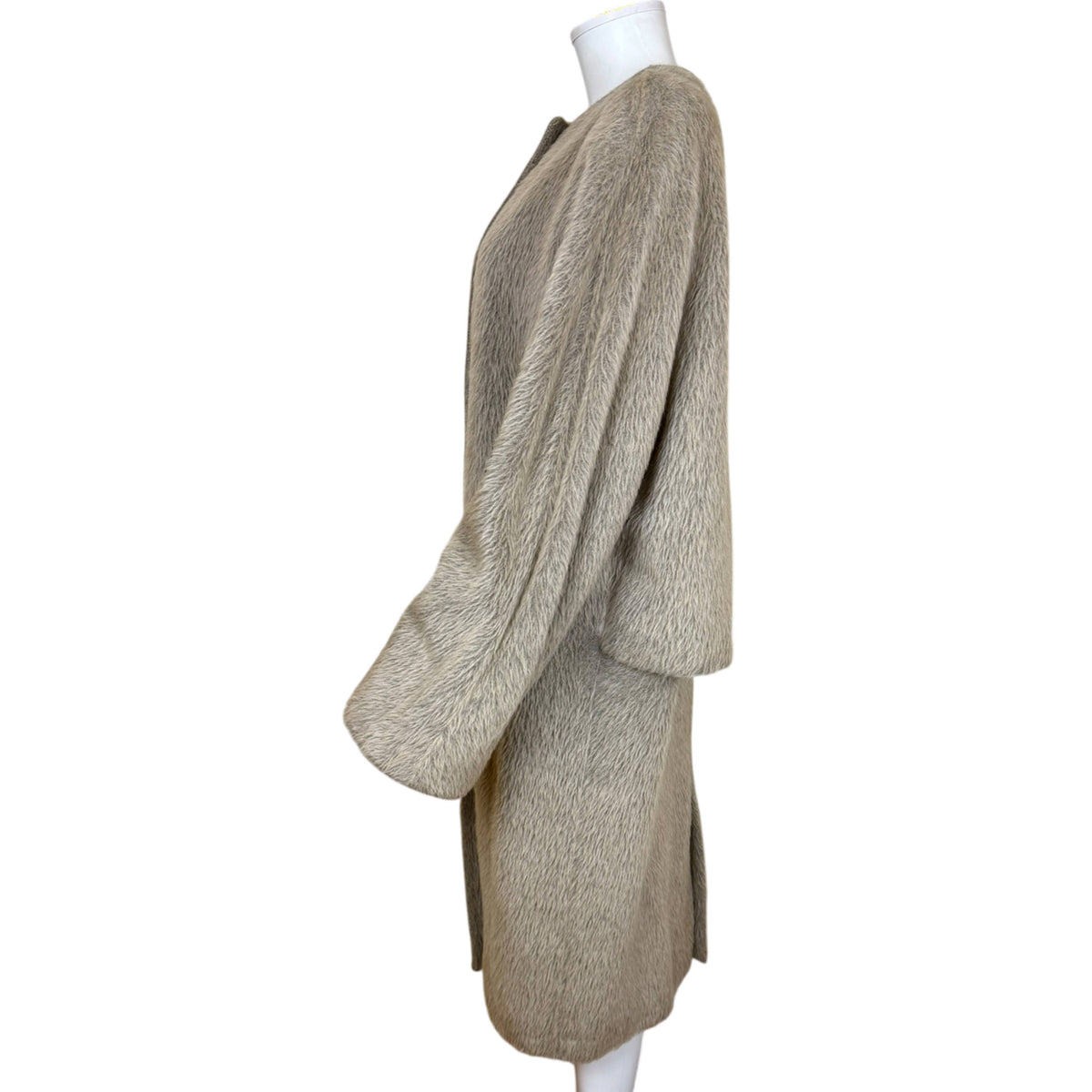 Side view of vintage Gianfranco Ferré taupe-grey alpaca coat showing long sleeves and relaxed silhouette