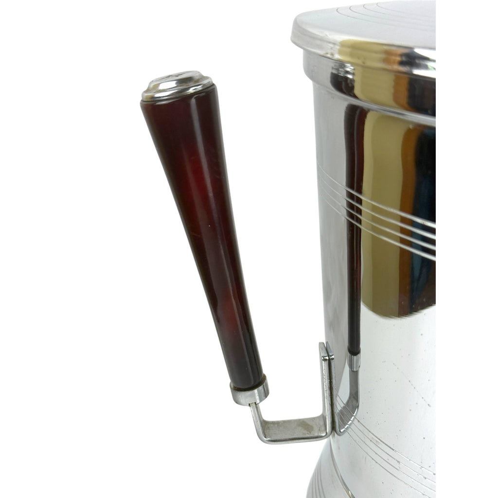 Close-up of cherry red Bakelite handle on Glo-Hill ice bucket