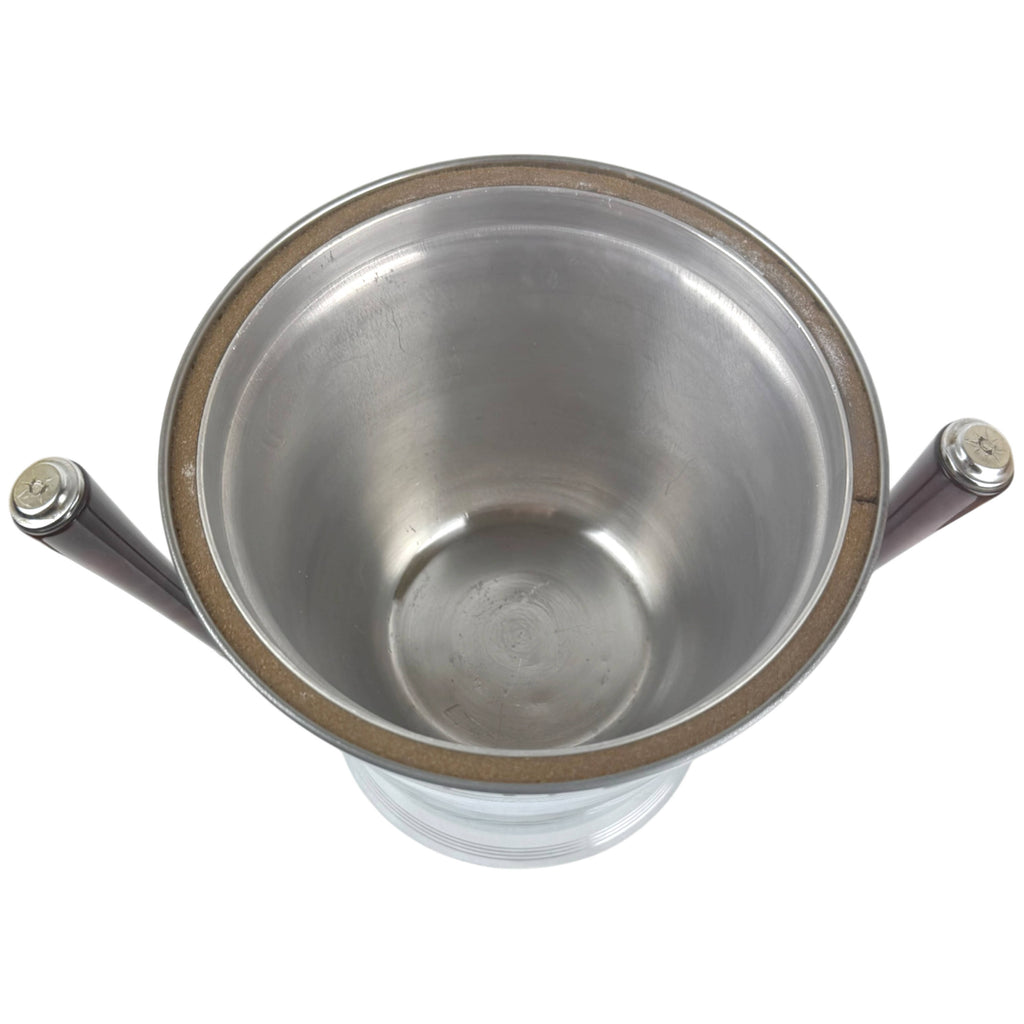 Interior view of vintage chrome ice bucket without glass liner