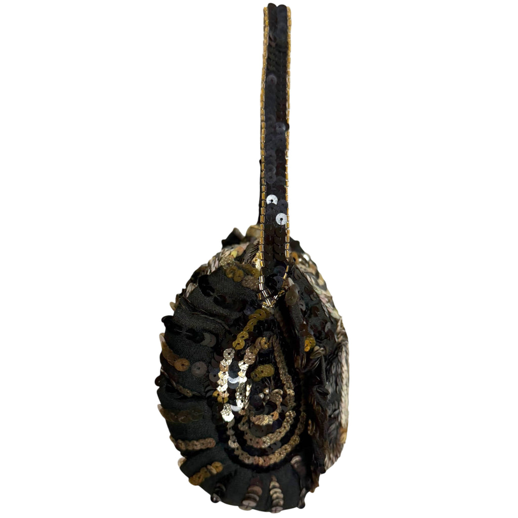 Side view of 1930s sequinned evening bag with flounced panels