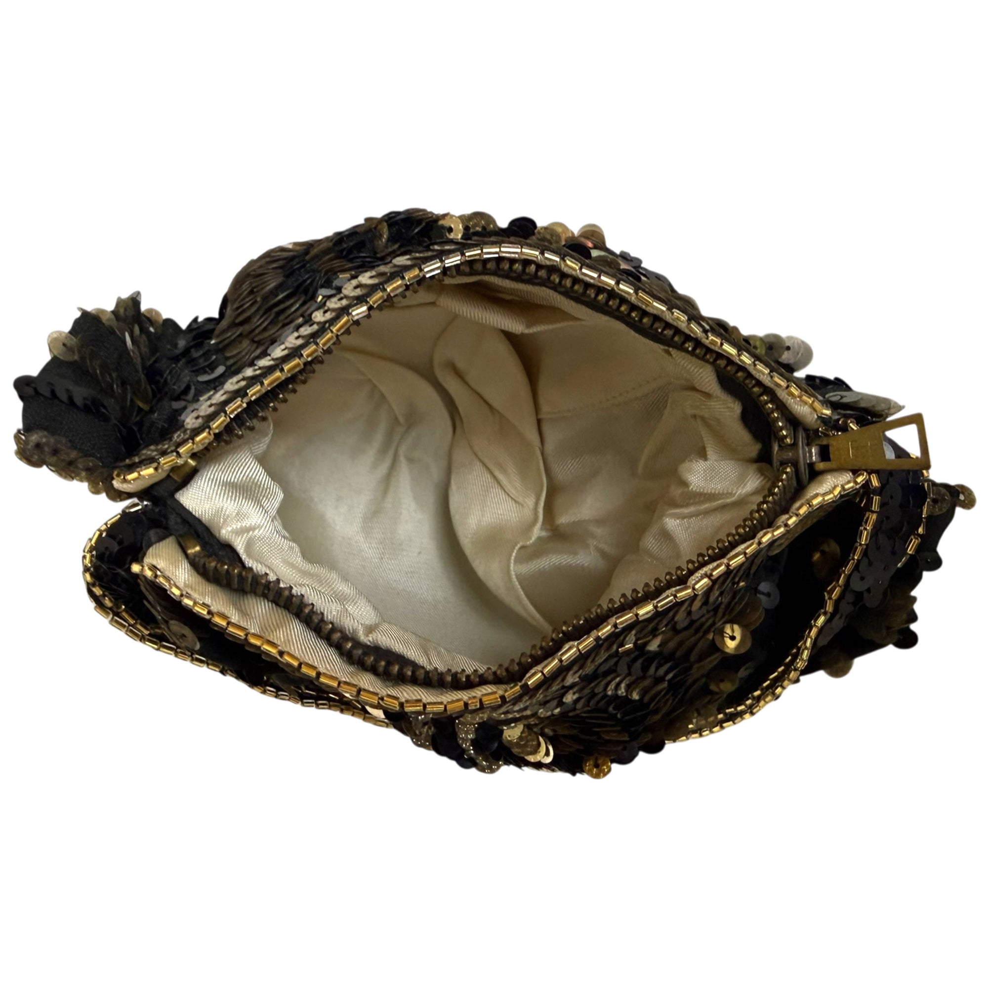 Off-white satin lining and interior pocket of 1930s Belgian evening purse
