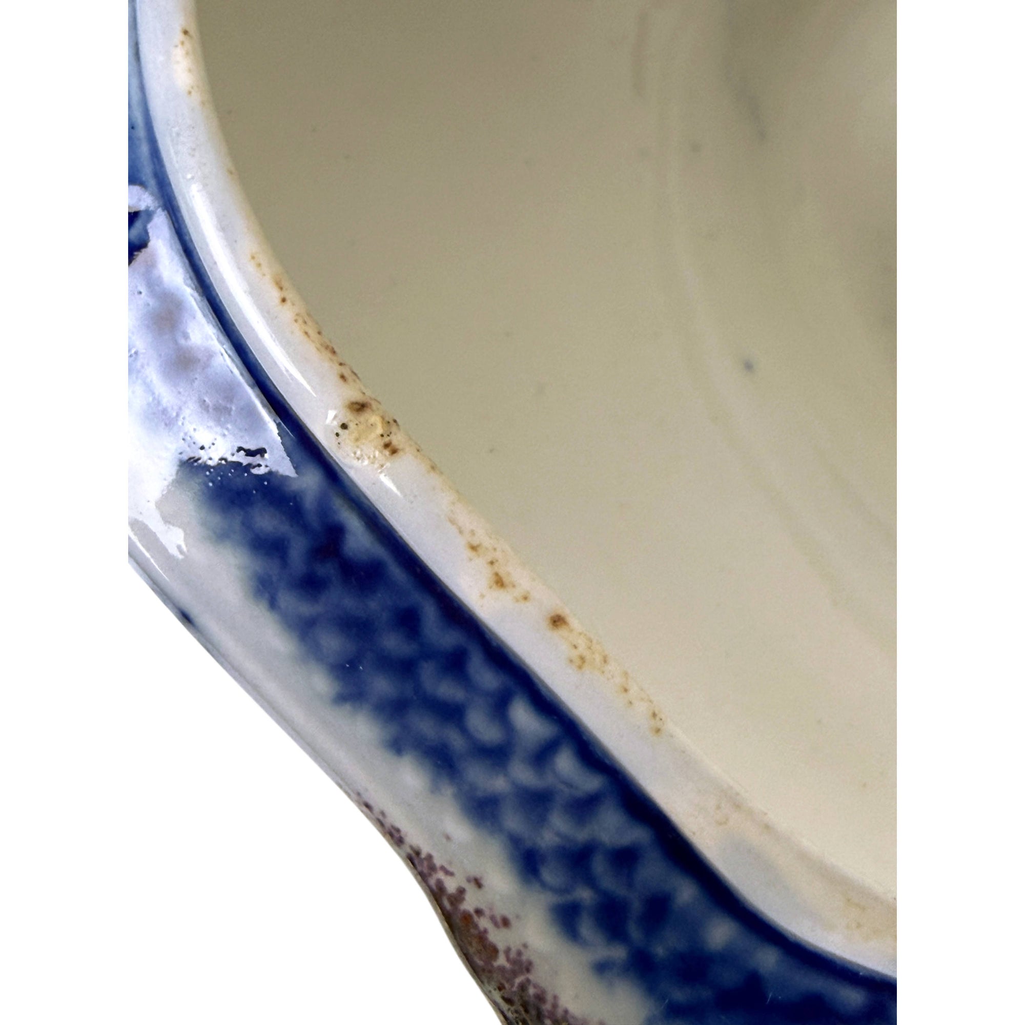 corrosion to top edge glaze