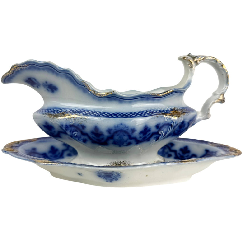 Victorian flow blue gravy boat with matching tray