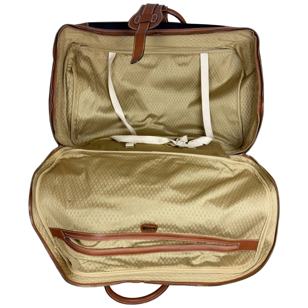 Vintage Gucci luggage interior with retaining straps
