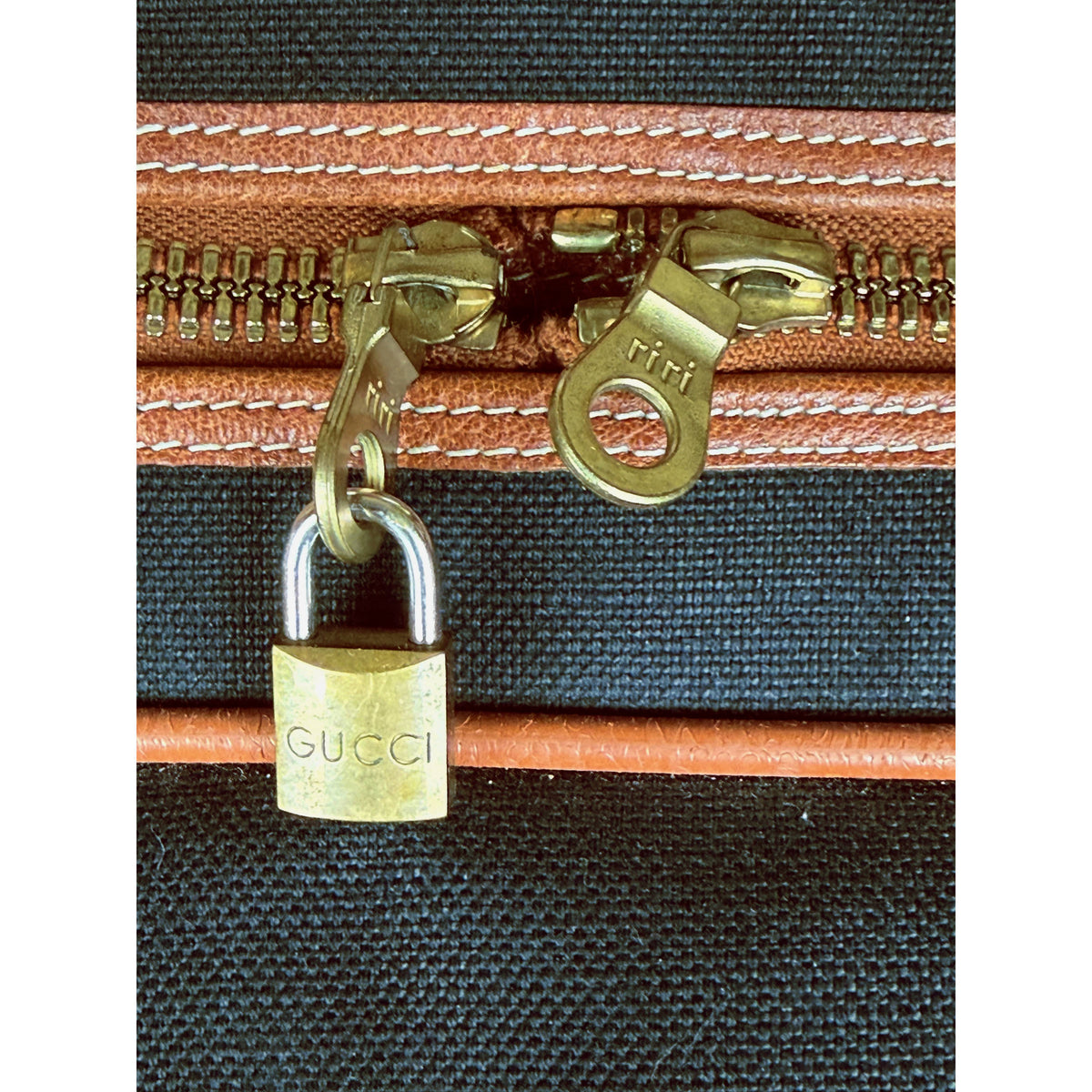 Vintage Gucci padlock and Riri marked zipper pulls