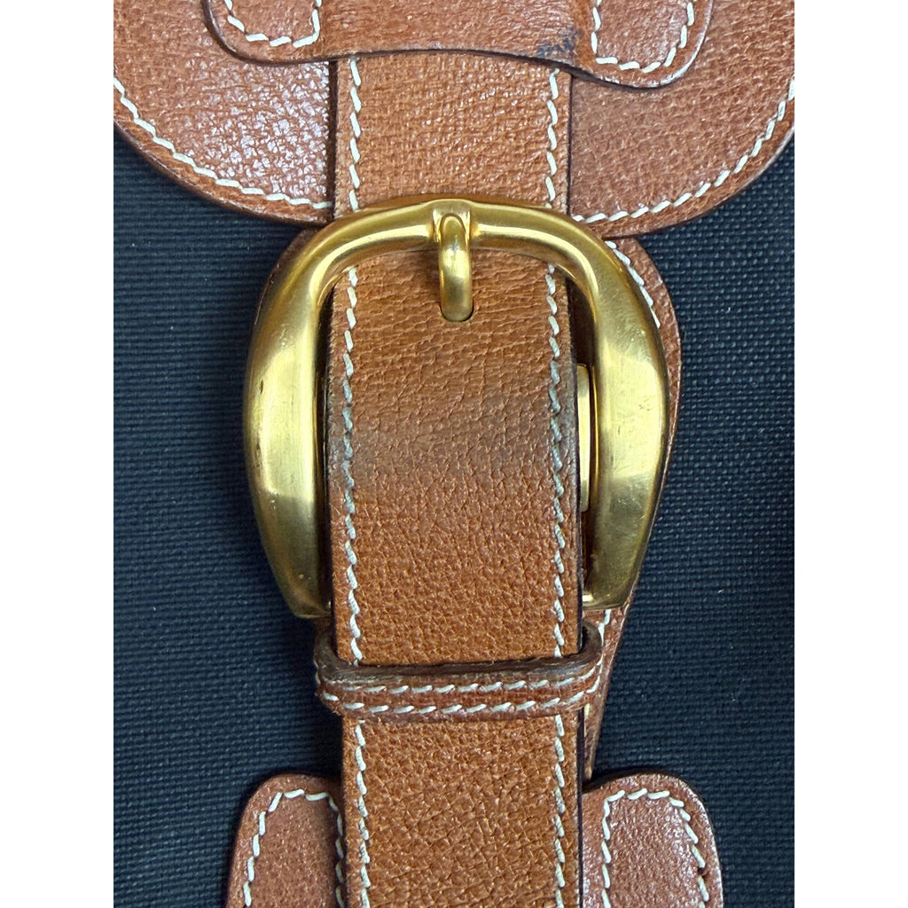 Vintage Gucci suitcase brass buckle and leather strap detail