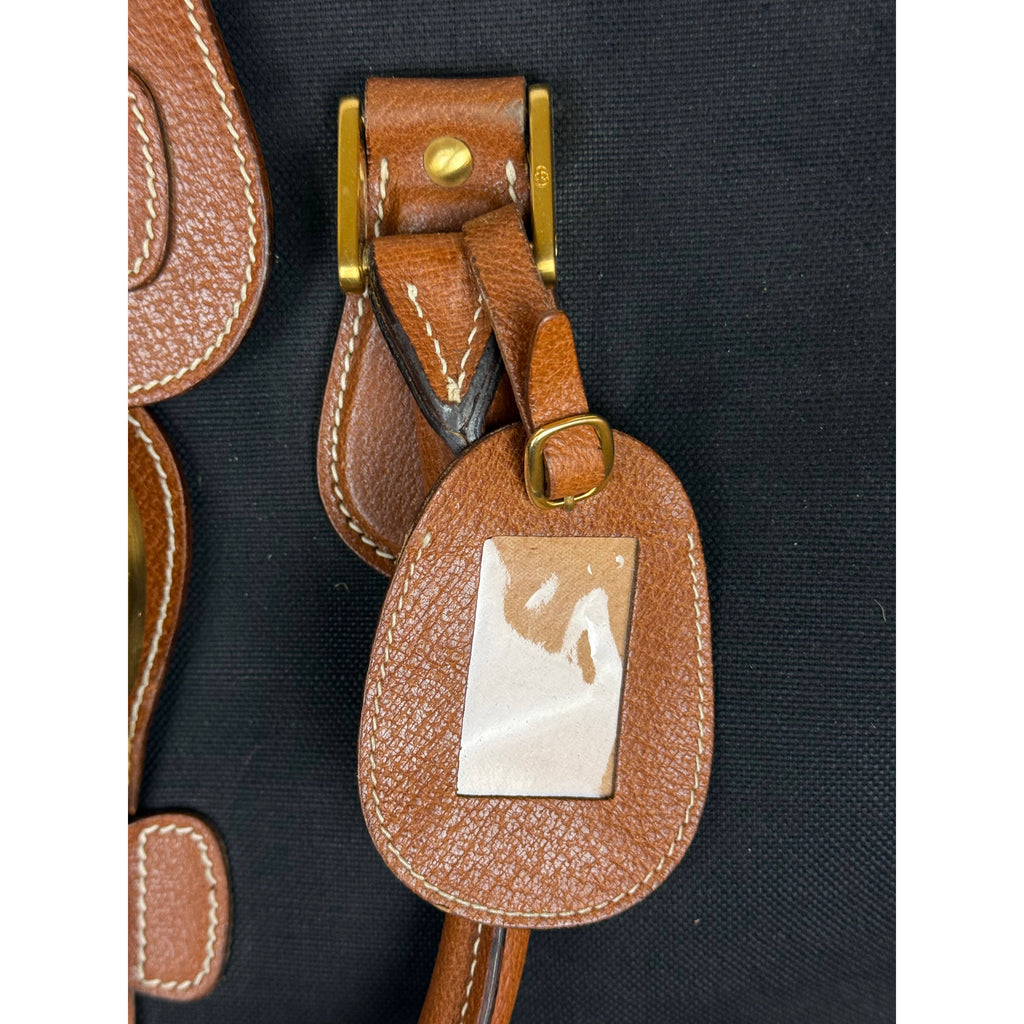 Vintage Gucci leather luggage tag