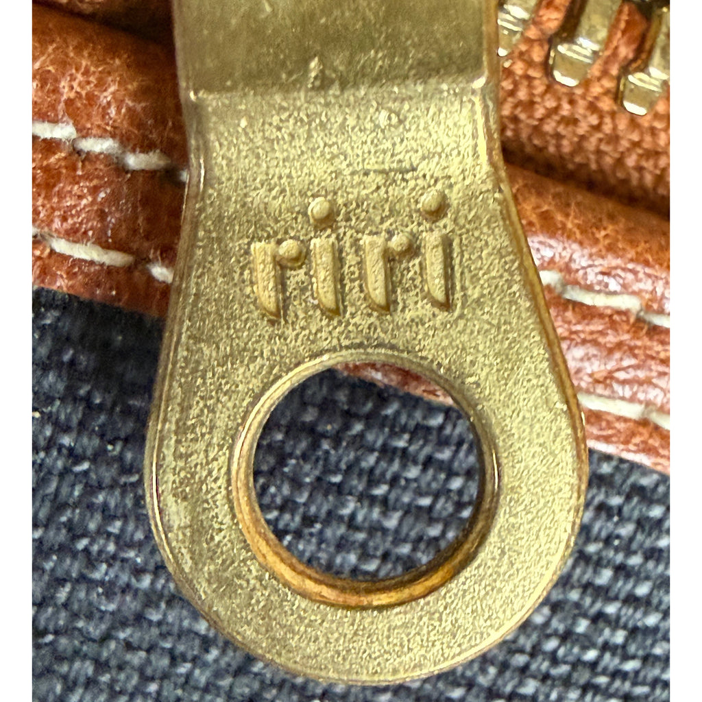 Vintage Riri marked zipper pull detail