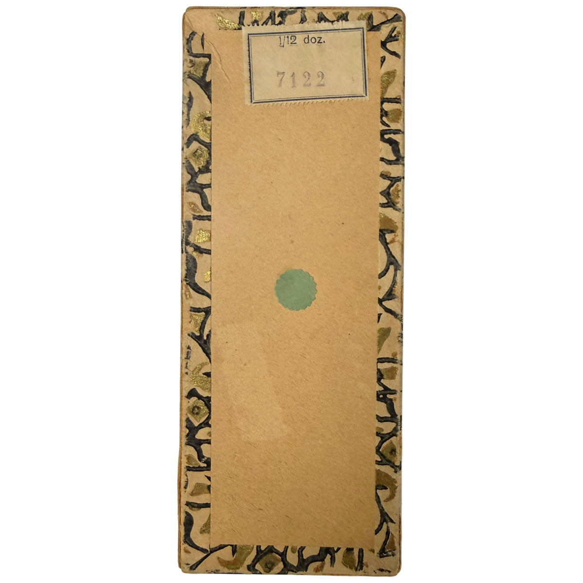 Underside of vintage Pierrot doll box showing old printed label marked 1/12 doz. and number 7122