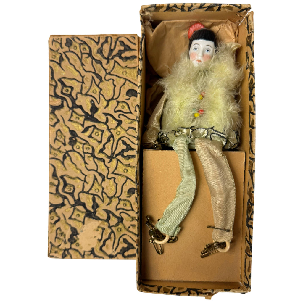 Antique 1920s Pierrot porcelain half-doll pincushion displayed in decorative vintage cardboard box with lid