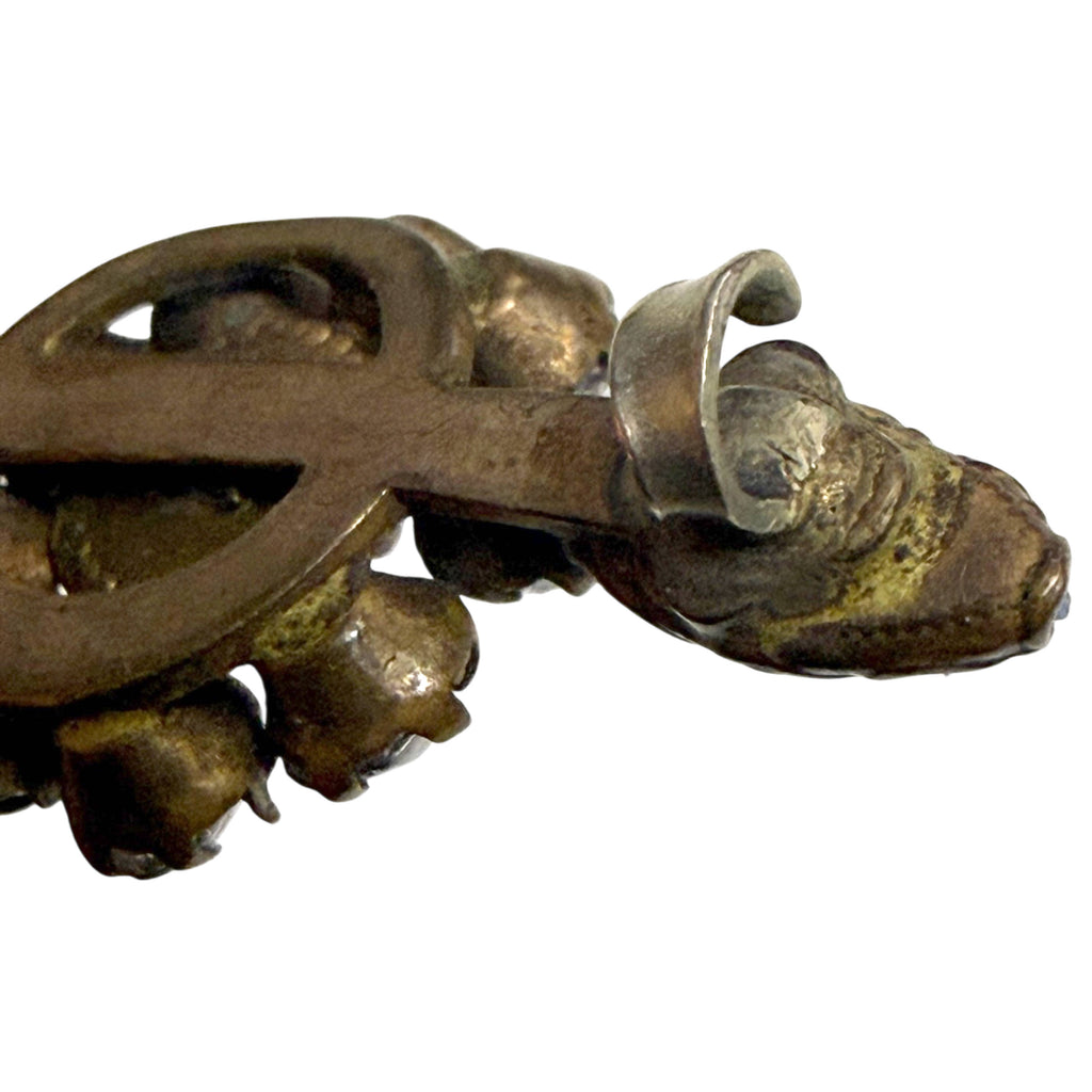 Detail of hand-soldered hook catch and pin stem on antique Victorian bar brooch