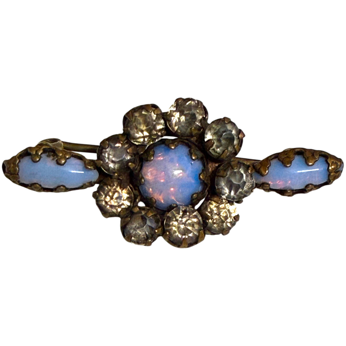 Antique Victorian bar brooch with three milky blue opal glass cabochons and surrounding clear paste rhinestones circa 1890