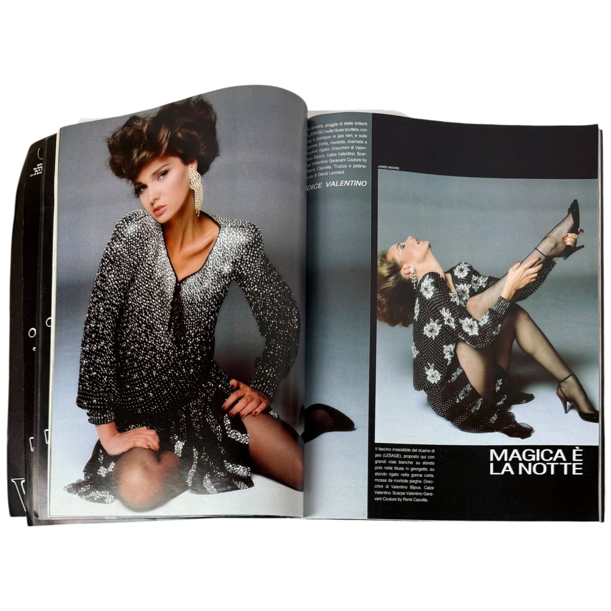 An open vintage Valentino magazine spread featuring a glamour photograph of a woman in a sparkling black dress on the left page and another fashion photo on the right page with the headline 'MAGICA È LA NOTTE'.
