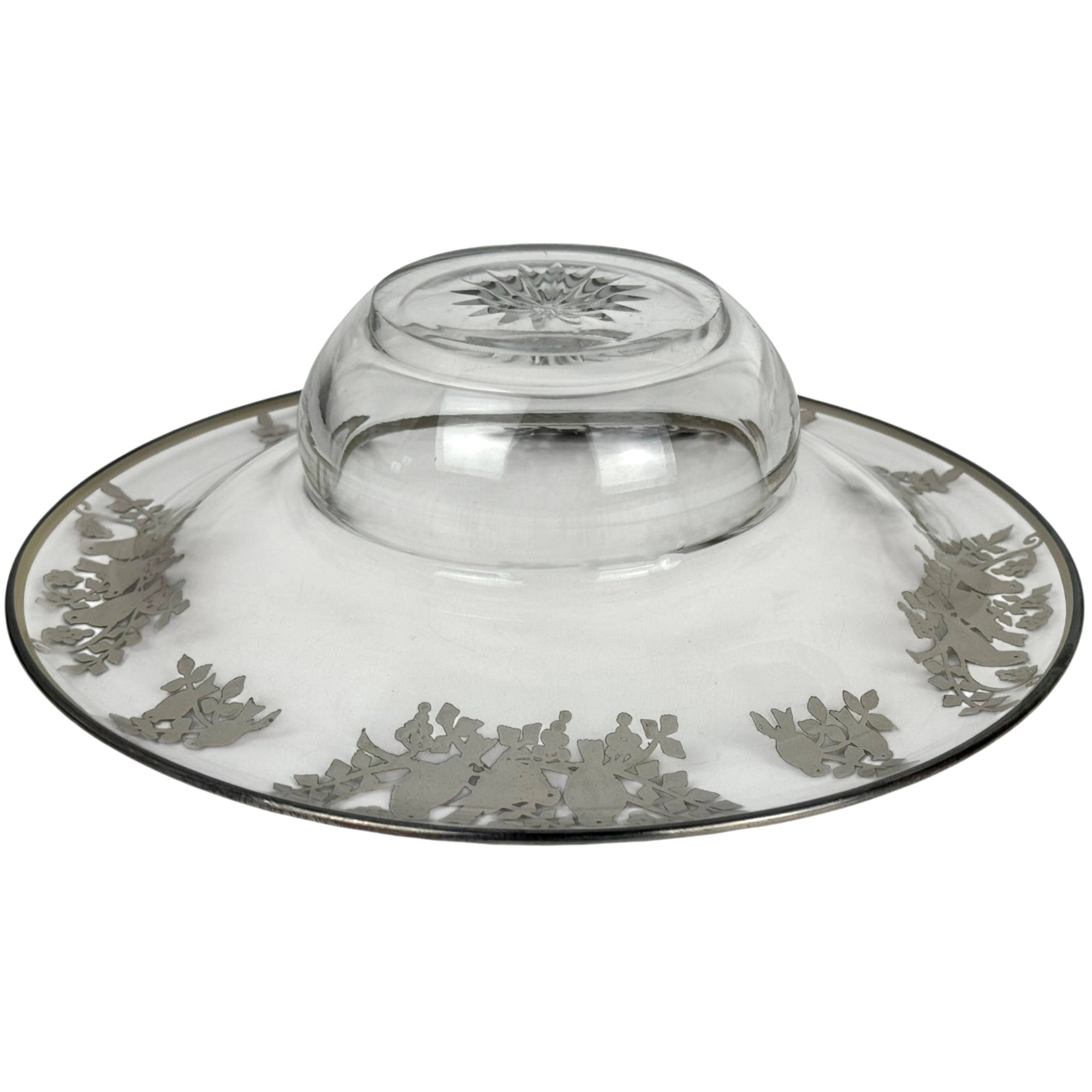 Underside of Heisey glass bowl showing starburst cut base