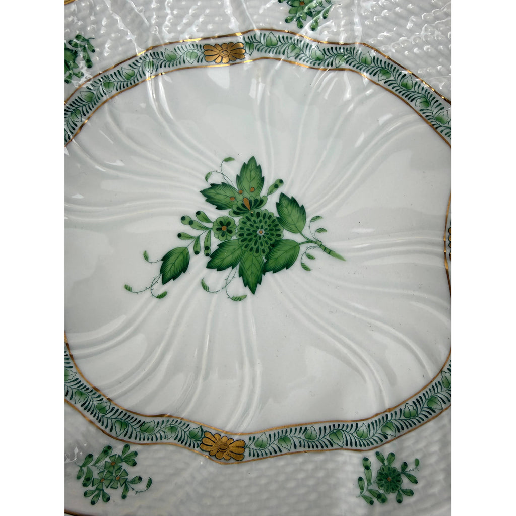 Close up of Herend green floral spray and gilt border