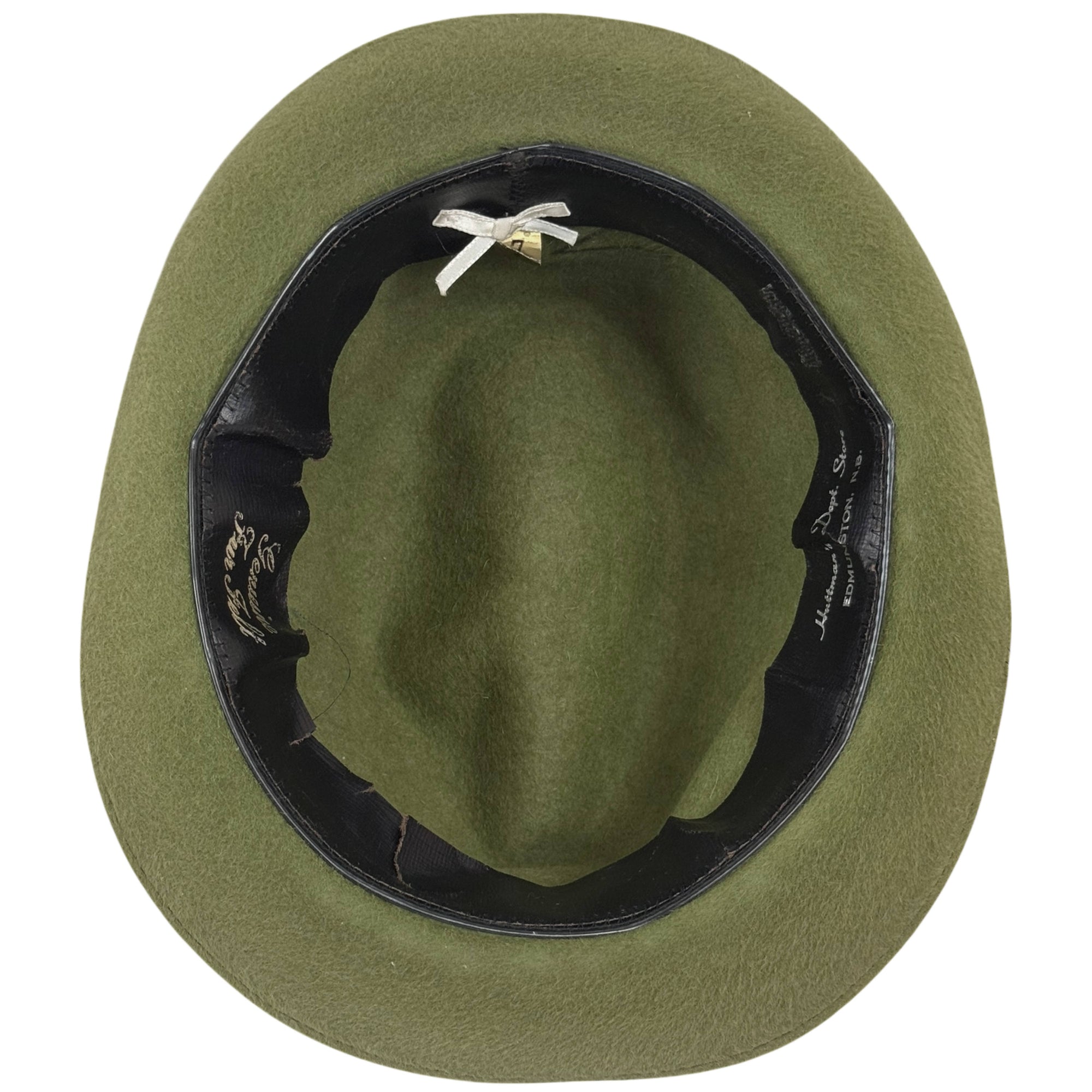 Green felt hat with black band on a white background