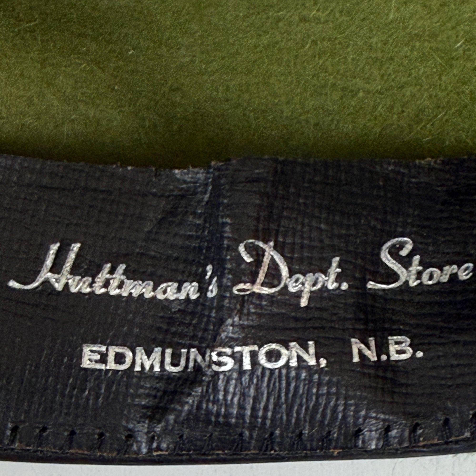 Huttman’s Dept Store Edmunston NB sweatband stamp detail