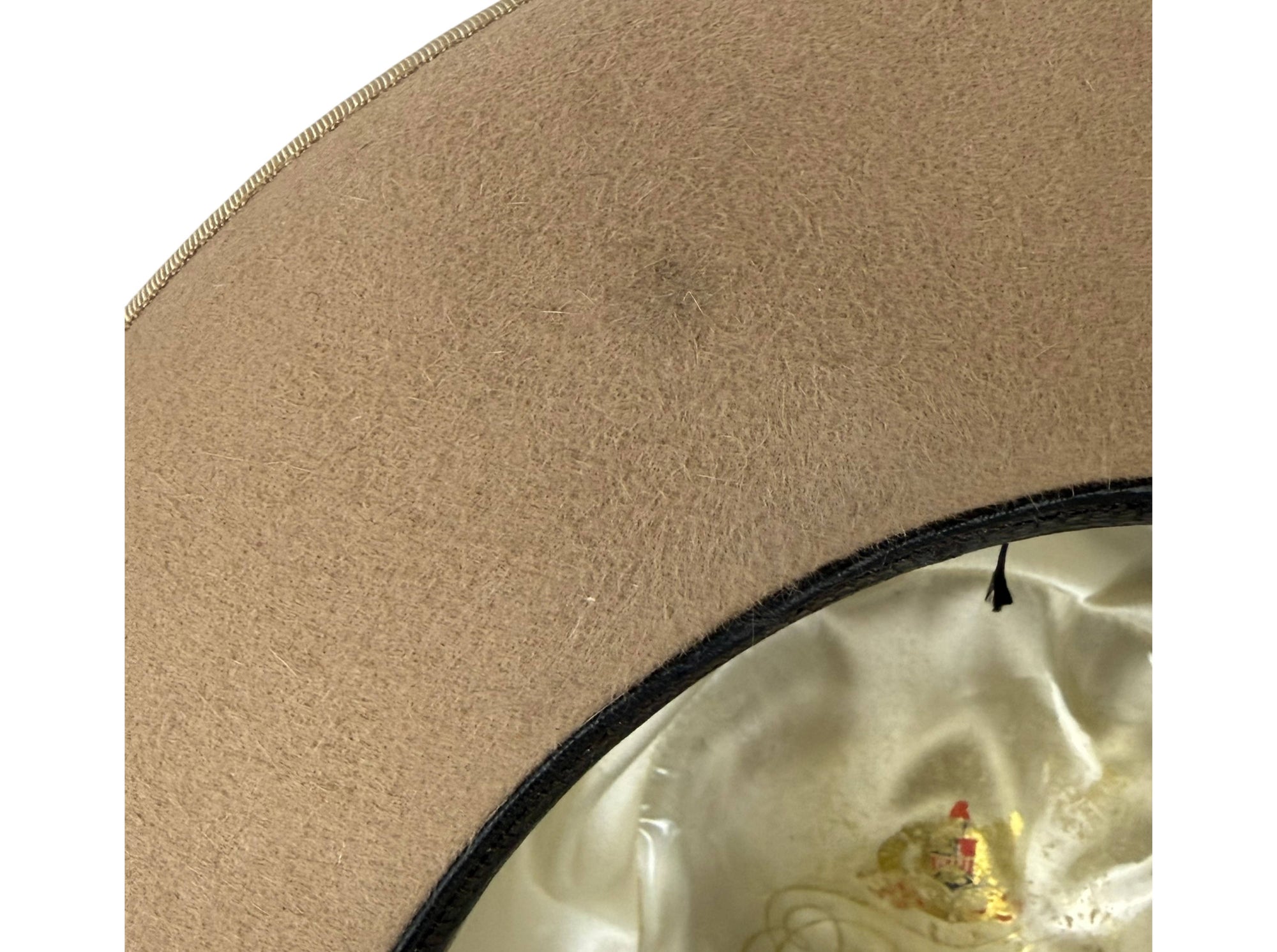 dark mark on underside of brim