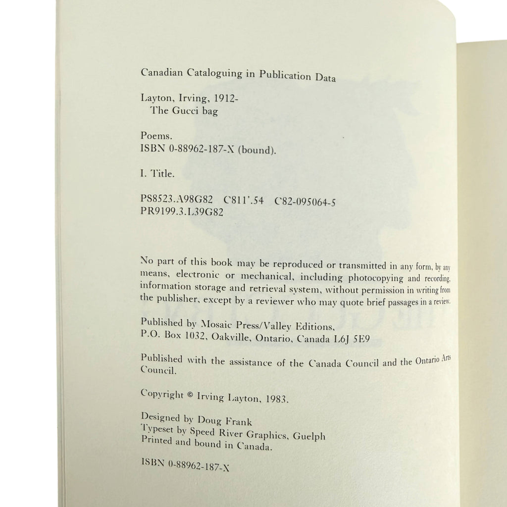 A close-up of a book's printed interior page showing publication and copyright details for 'Canadian Cataloguing in Publication Data' by Layton, Irving, 1912, titled 'The Gucci bag'.