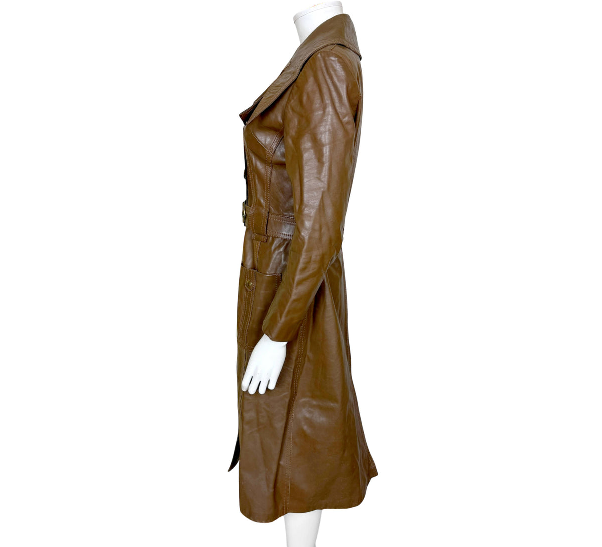 Vintage Irving Posluns leather coat side view showing long fitted silhouette