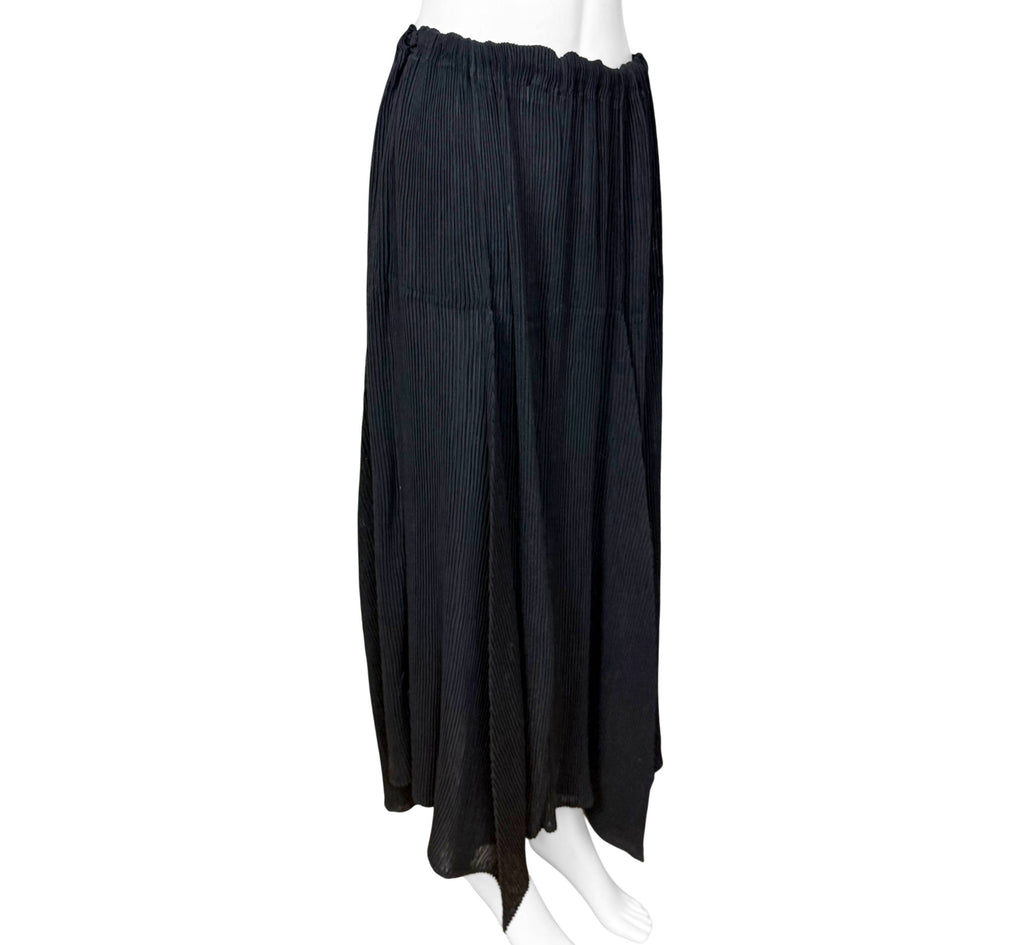 angle view of 1996 Issey Miyake black pleated skirt with asymmetric handkerchief hem