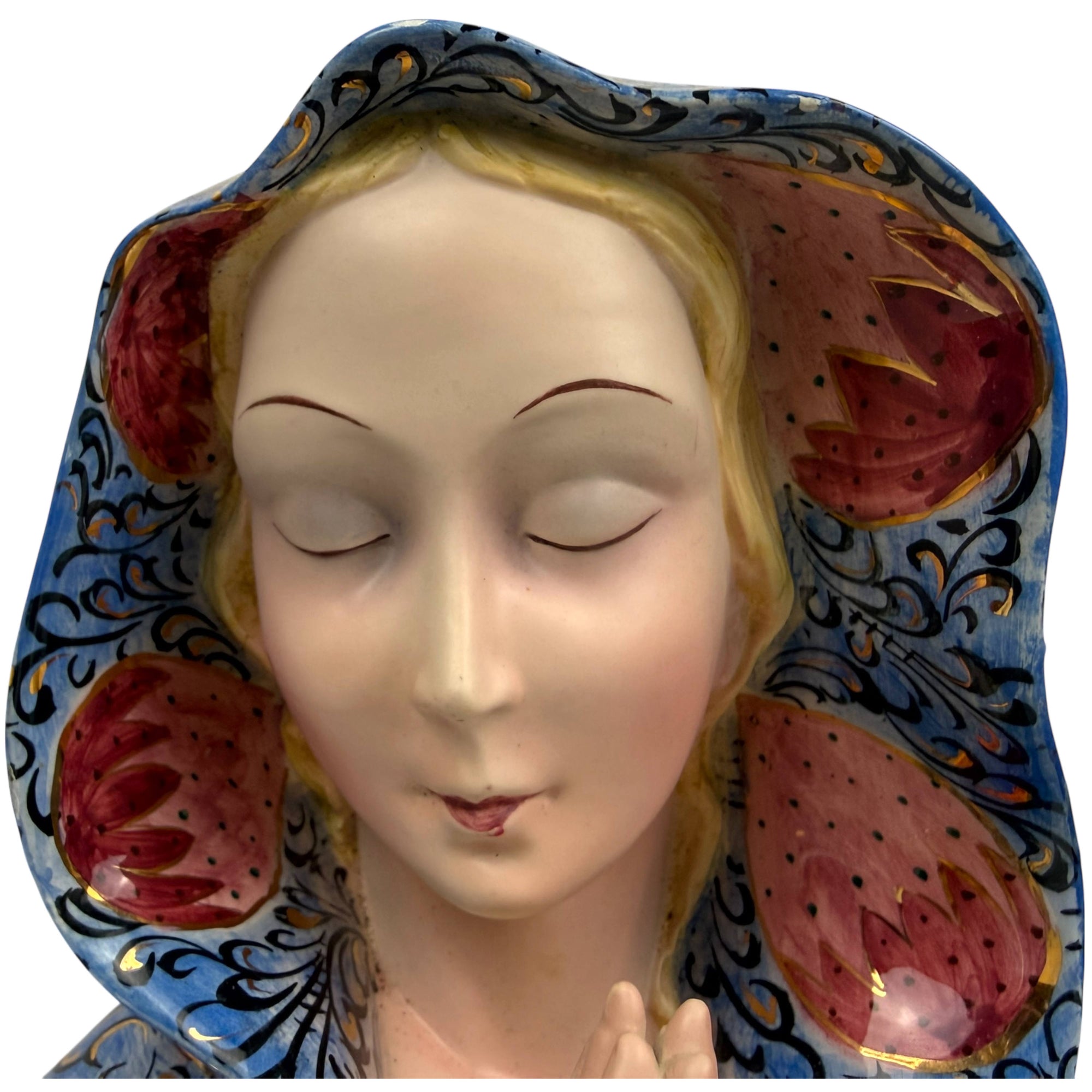 facial close up of religious ceramic Madonna sculpture made in Italy