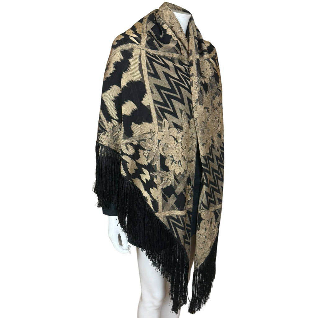 Side view of Italian silk blend shawl showing woven floral and zigzag patterns with long black fringe
