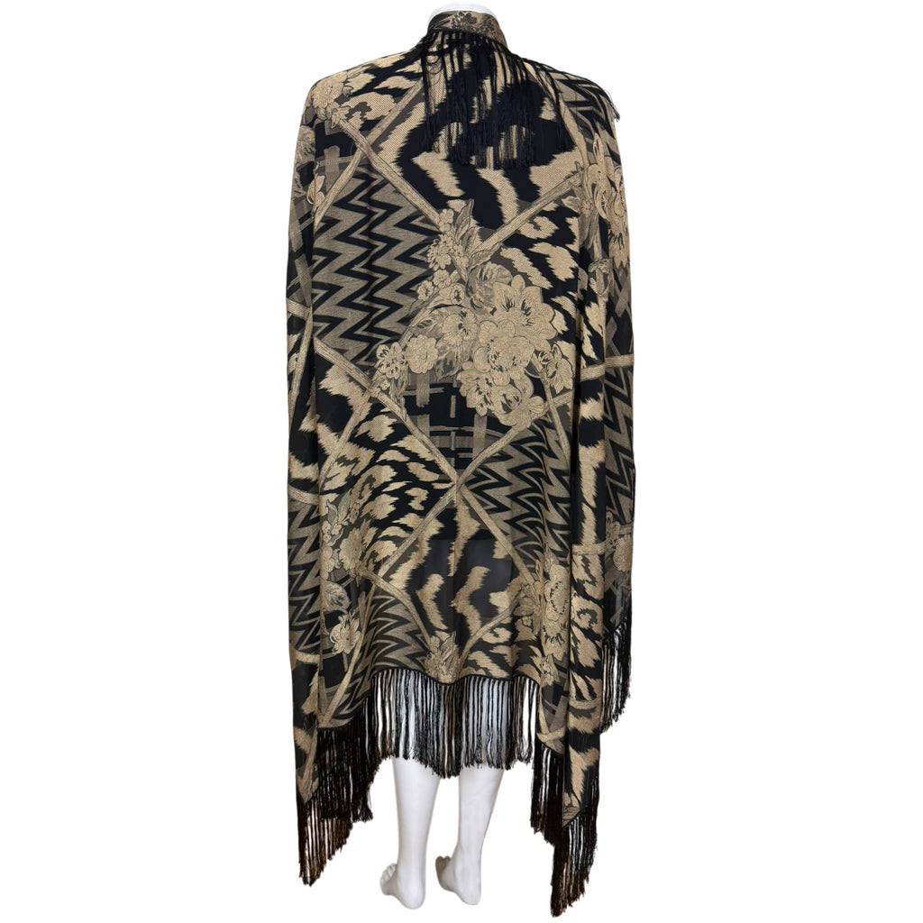 Vintage Italian silk blend jacquard shawl in black and antique gold with floral and geometric woven pattern and long black fringe, back view