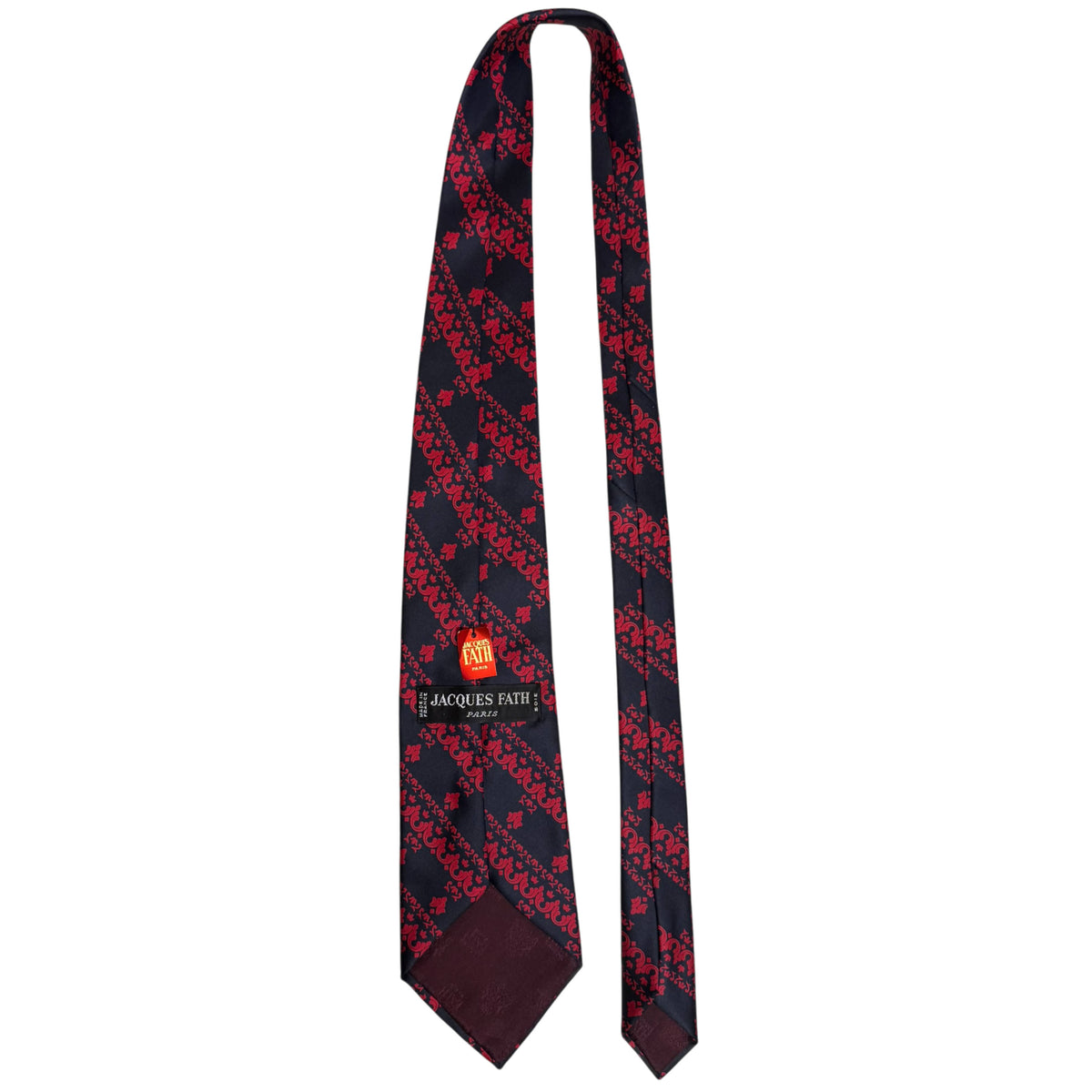Reverse view of vintage Jacques Fath Paris silk tie showing original labels, burgundy lining and full length