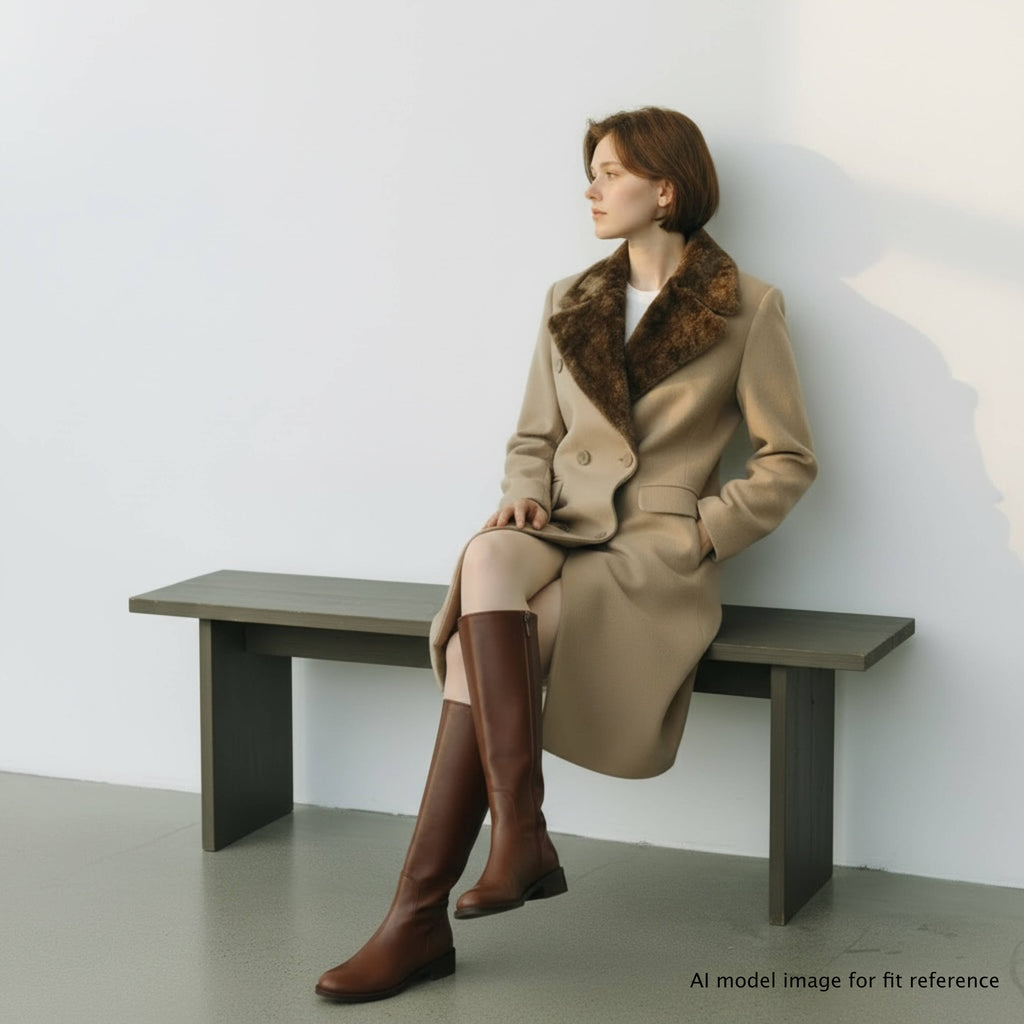 Vintage 1990s Jean Claude Poitras Wool Coat Qui M'aime Me Suive worn by sitting AI model