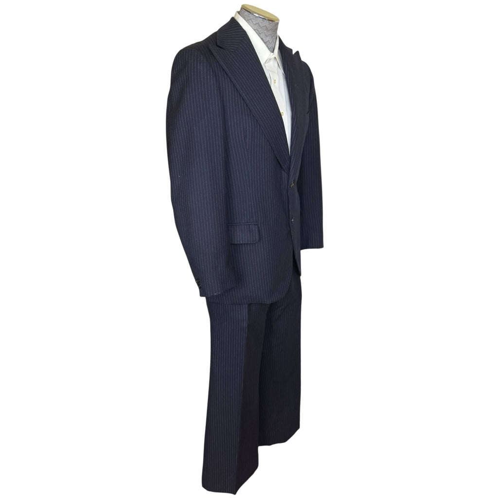 Kamel Shehata Cairo navy pinstripe suit three-quarter view