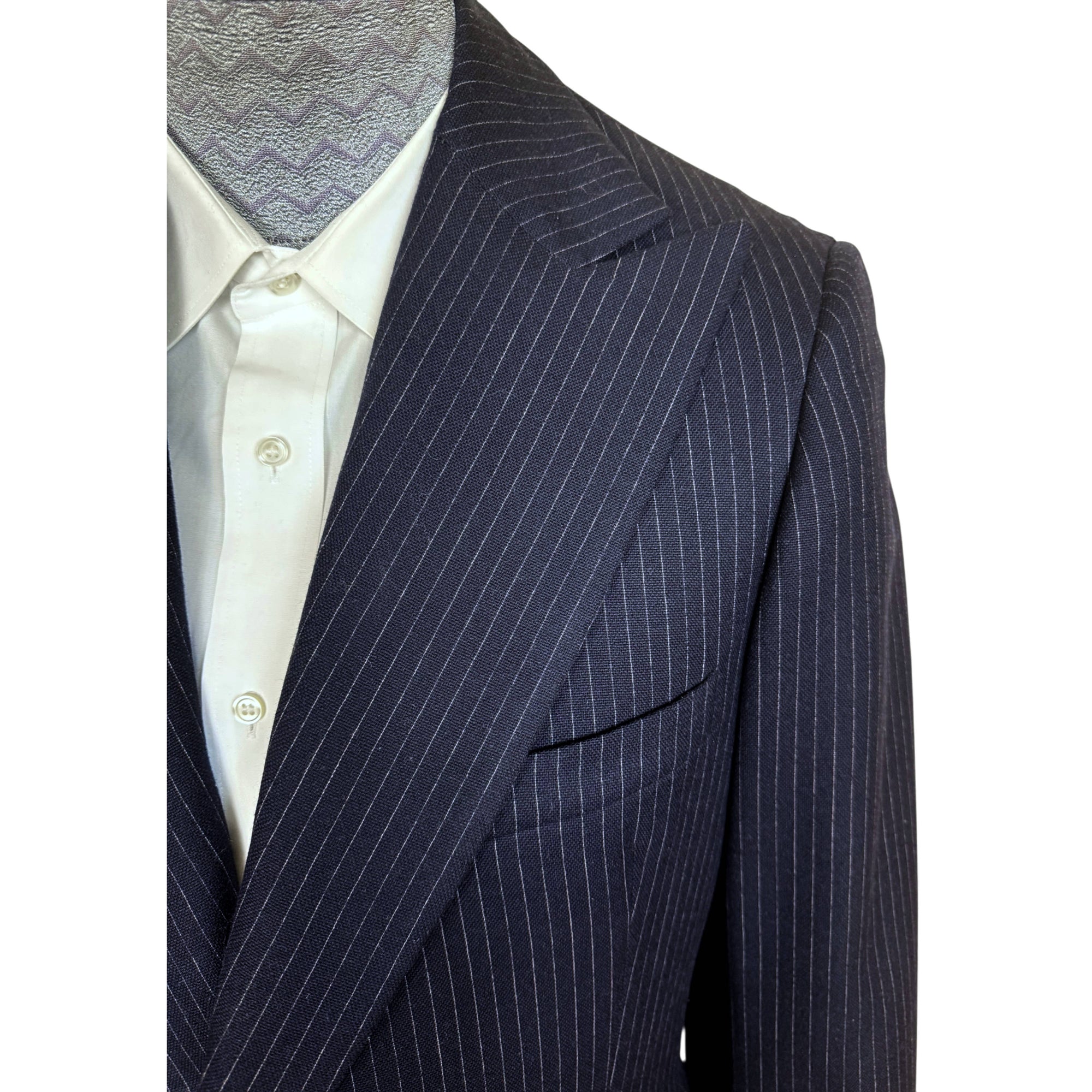 Wide peak lapel and pinstripe fabric detail on 1970s Kamel Shehata suit