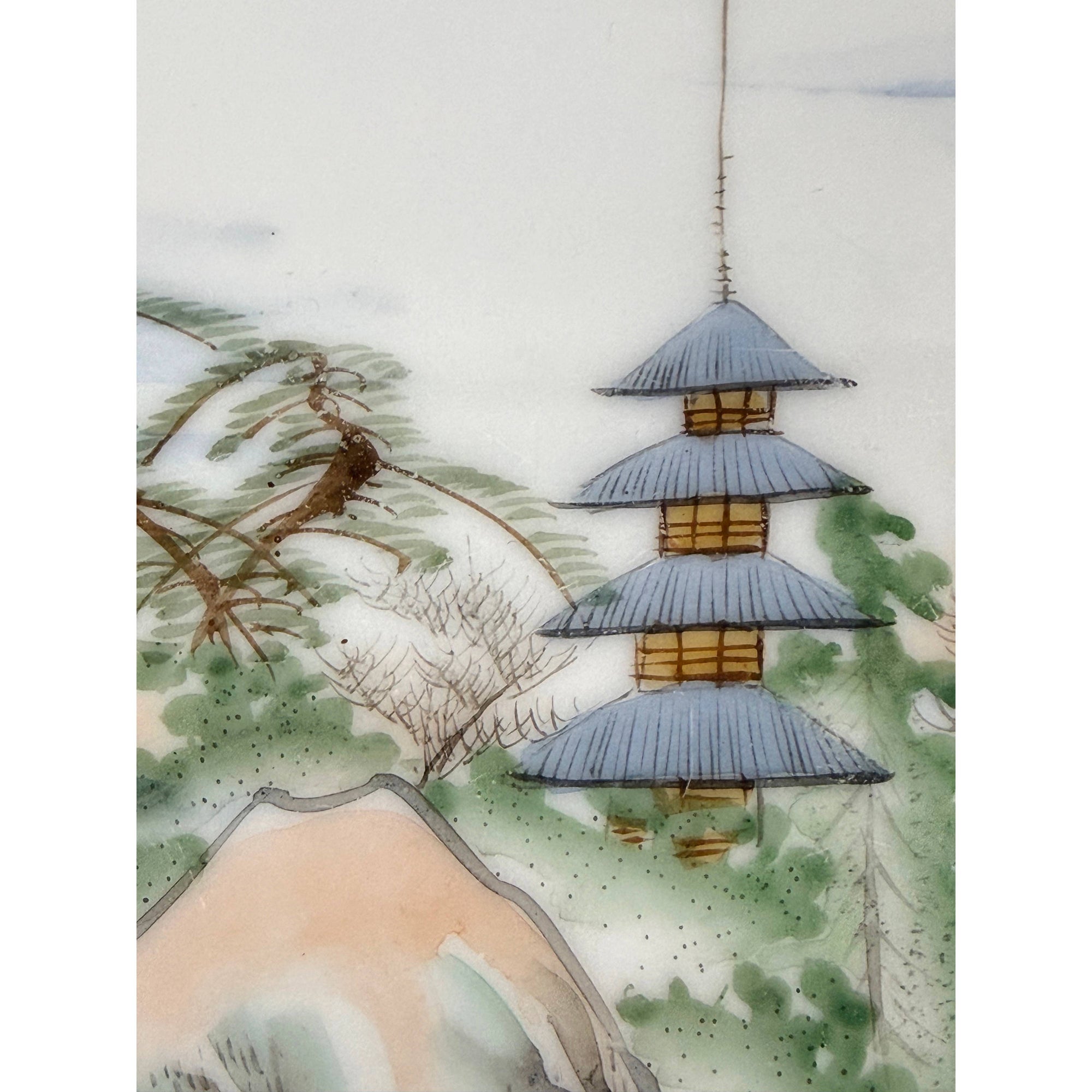Close up of pagoda on antique Kutani tray