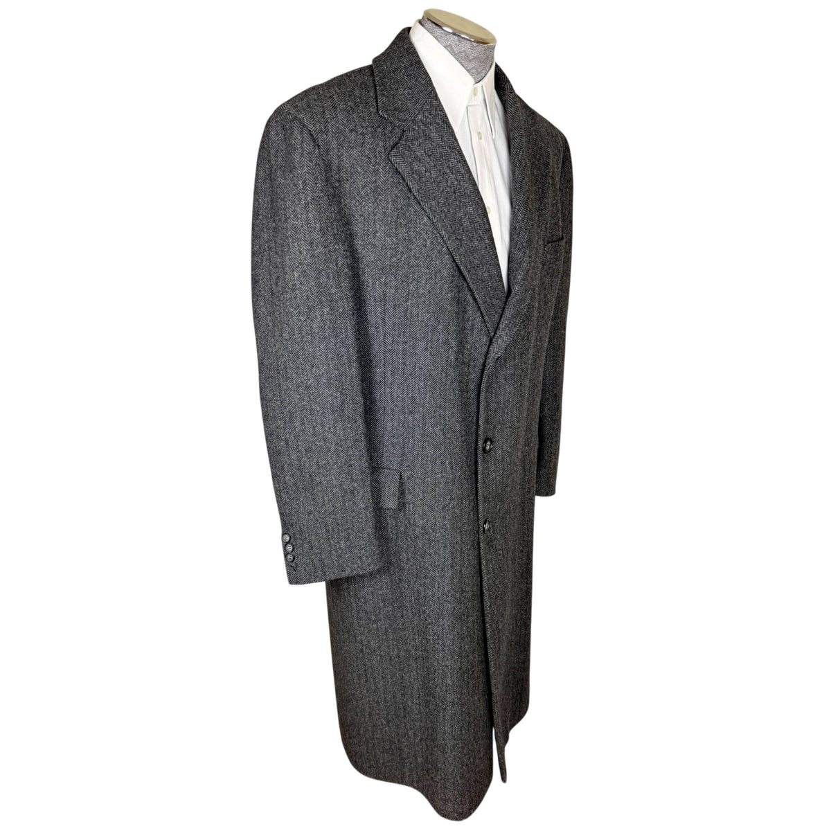 Three-quarter front view of vintage Canadian-made Cardinal Kynoch wool overcoat showing tailored silhouette