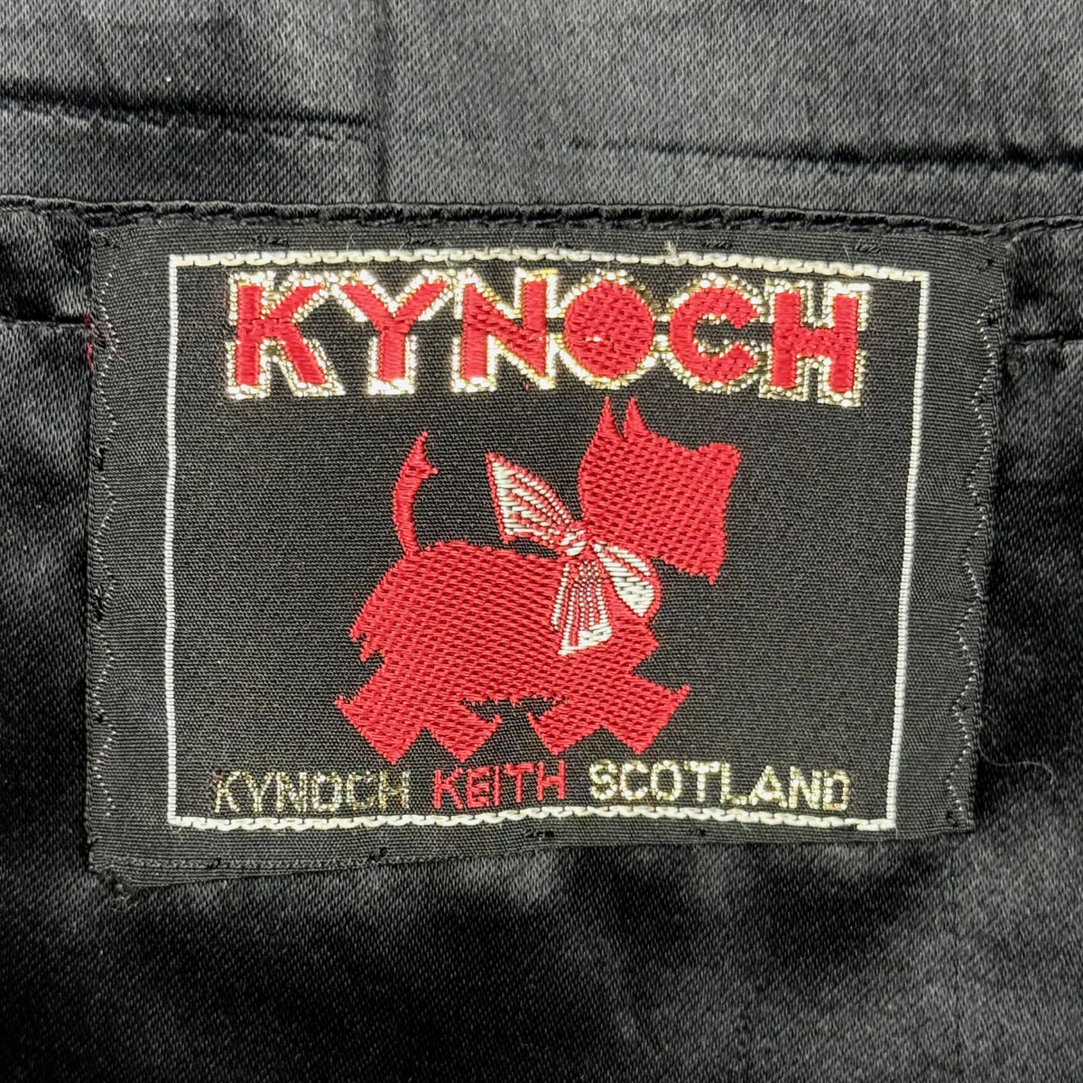 Original Kynoch Keith Scotland woven textile label with red Scottish terrier emblem
